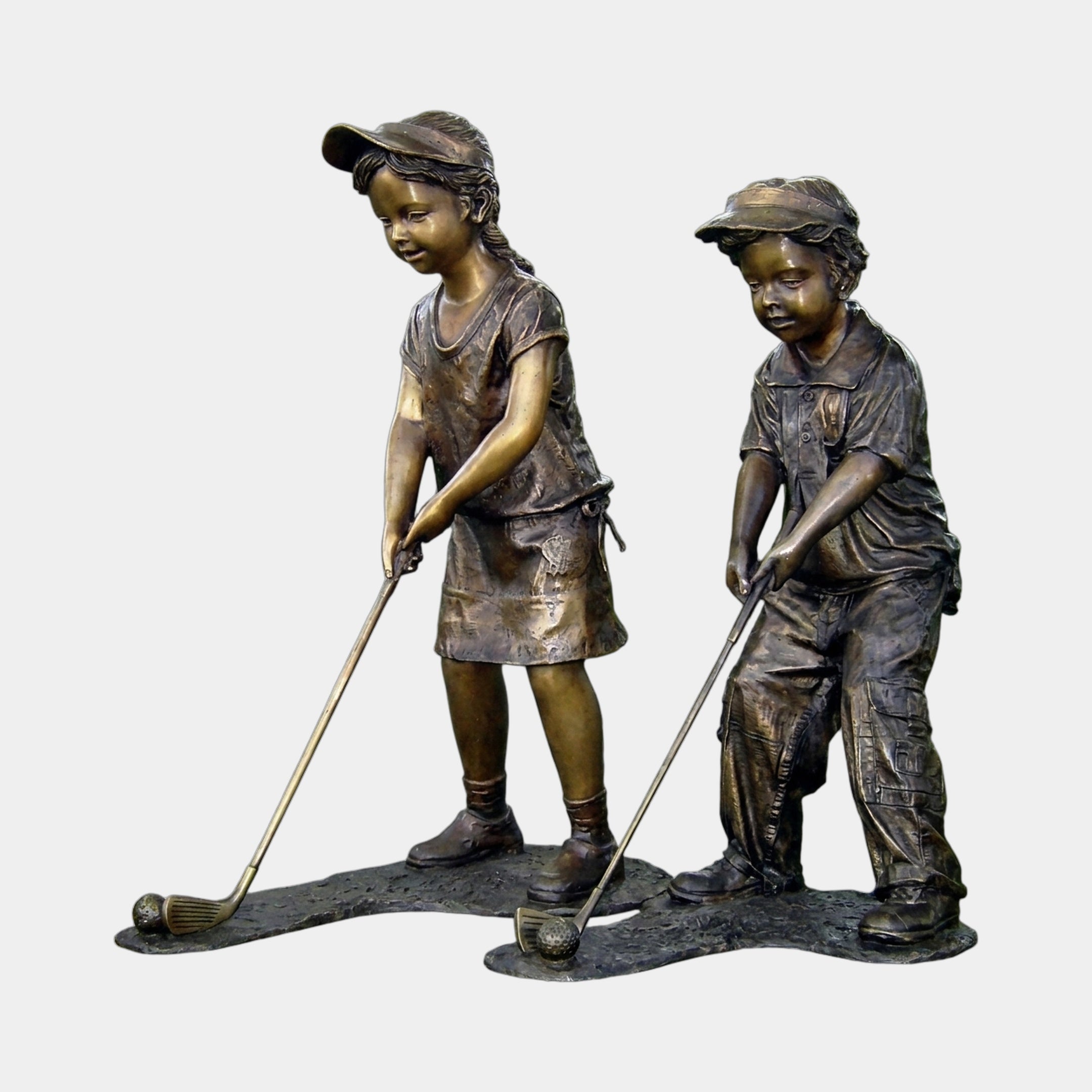 Giant Sculptures Life-Size Children Playing Golf Bronze Sculpture, 130cm, showing a girl and boy in caps mid-putt with clubs and balls on a shaped base.