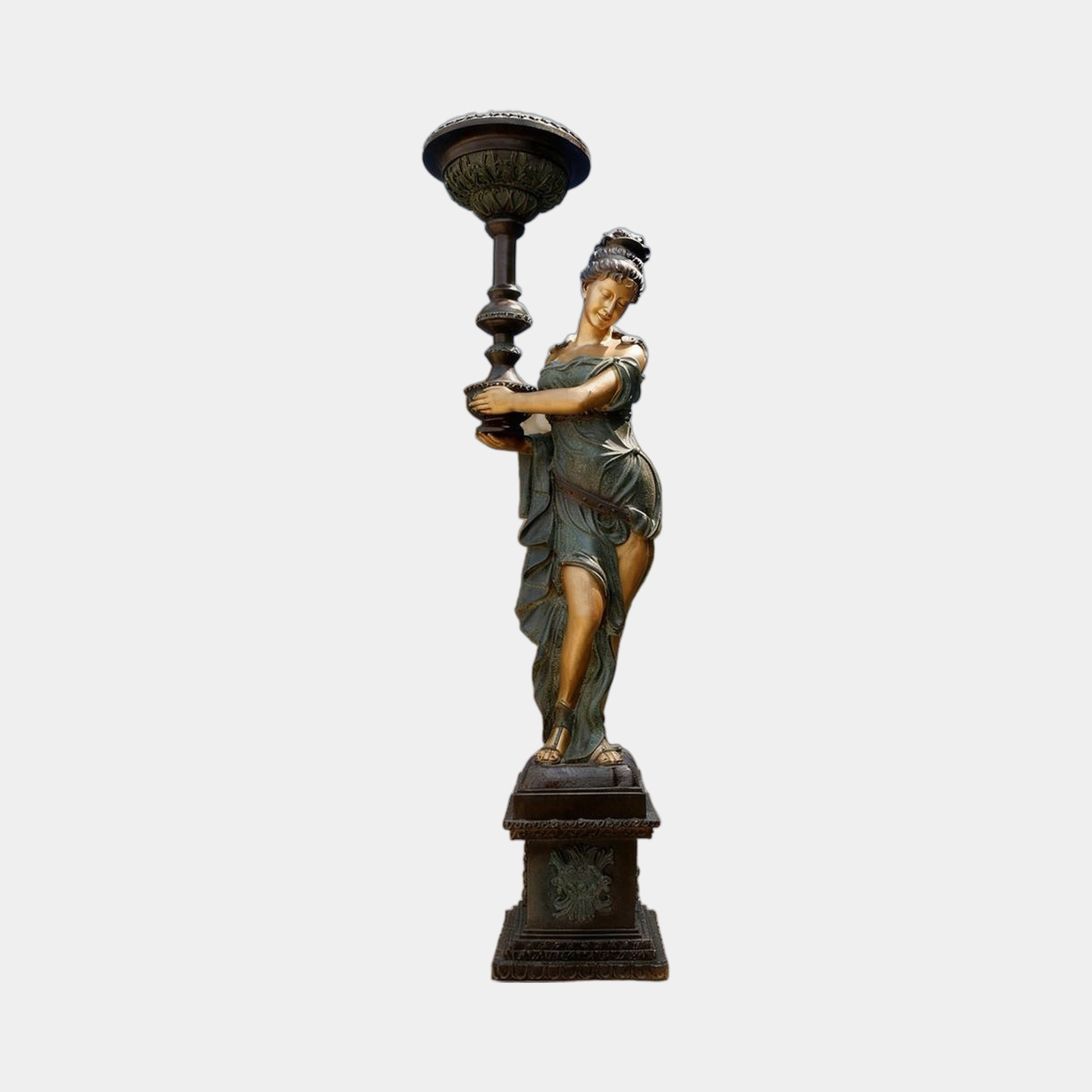 Life-Size Classical Goddess Lamp Bearer Bronze Sculpture by Giant Sculptures, draped female figure with verdigris patina holding a torch lamp on a stepped plinth.