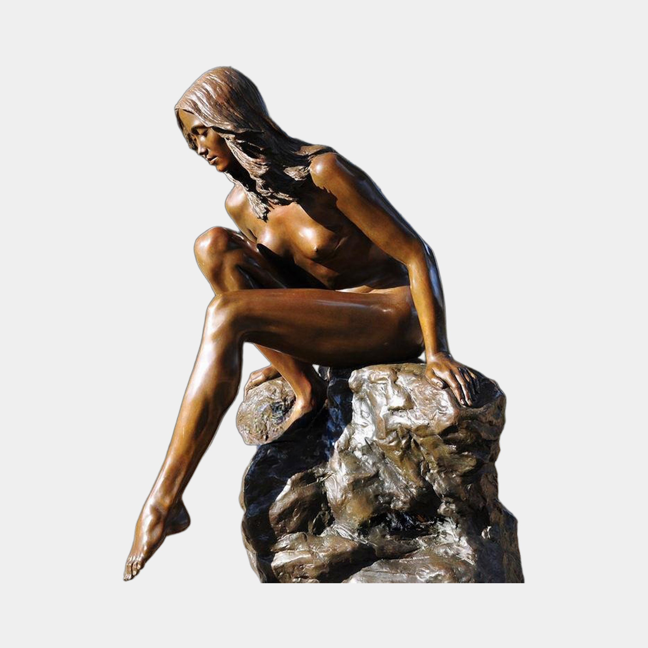 Giant Sculptures Life-Size Contemporary Seated Female Figure Bronze Sculpture 140cm, nude with cascading hair perched on a textured rocky base, warm brown patina.