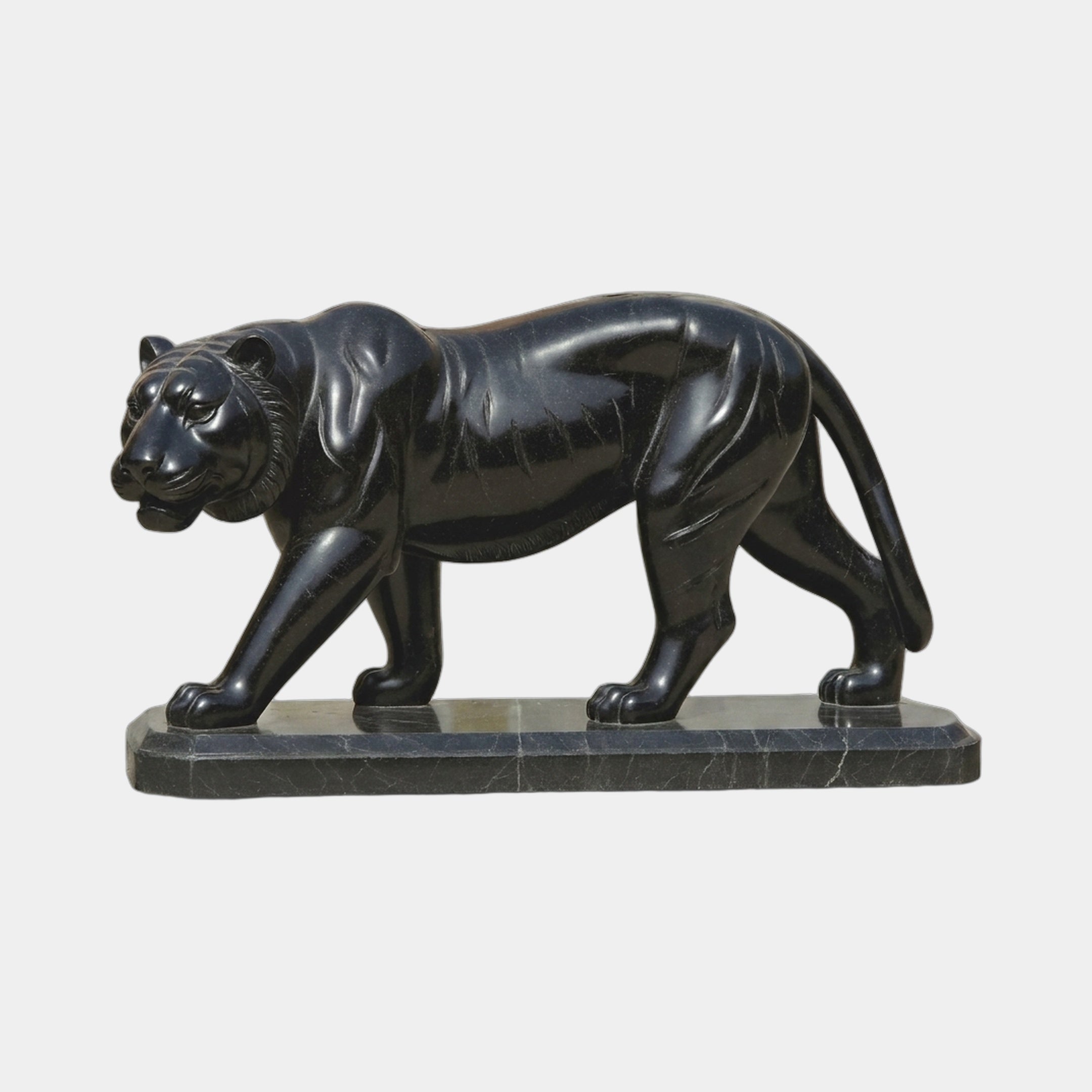 Life-Size Contemporary Walking Tiger Bronze Sculpture by Giant Sculptures in polished black finish, shown mid-stride on a dark marble plinth against a plain background.
