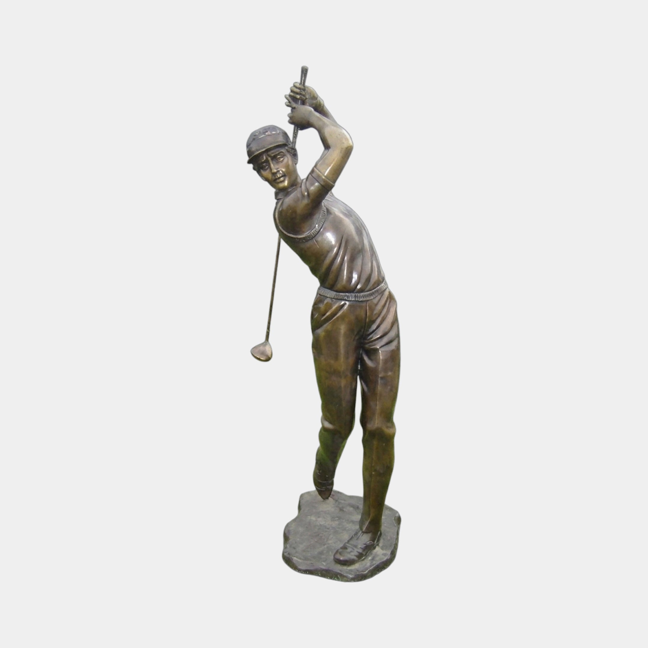 Giant Sculptures Life-Size Golfer Mid-Swing Bronze Sculpture 220cm, mid-brown patinated figure in cap completing a follow-through swing, on a shaped base.