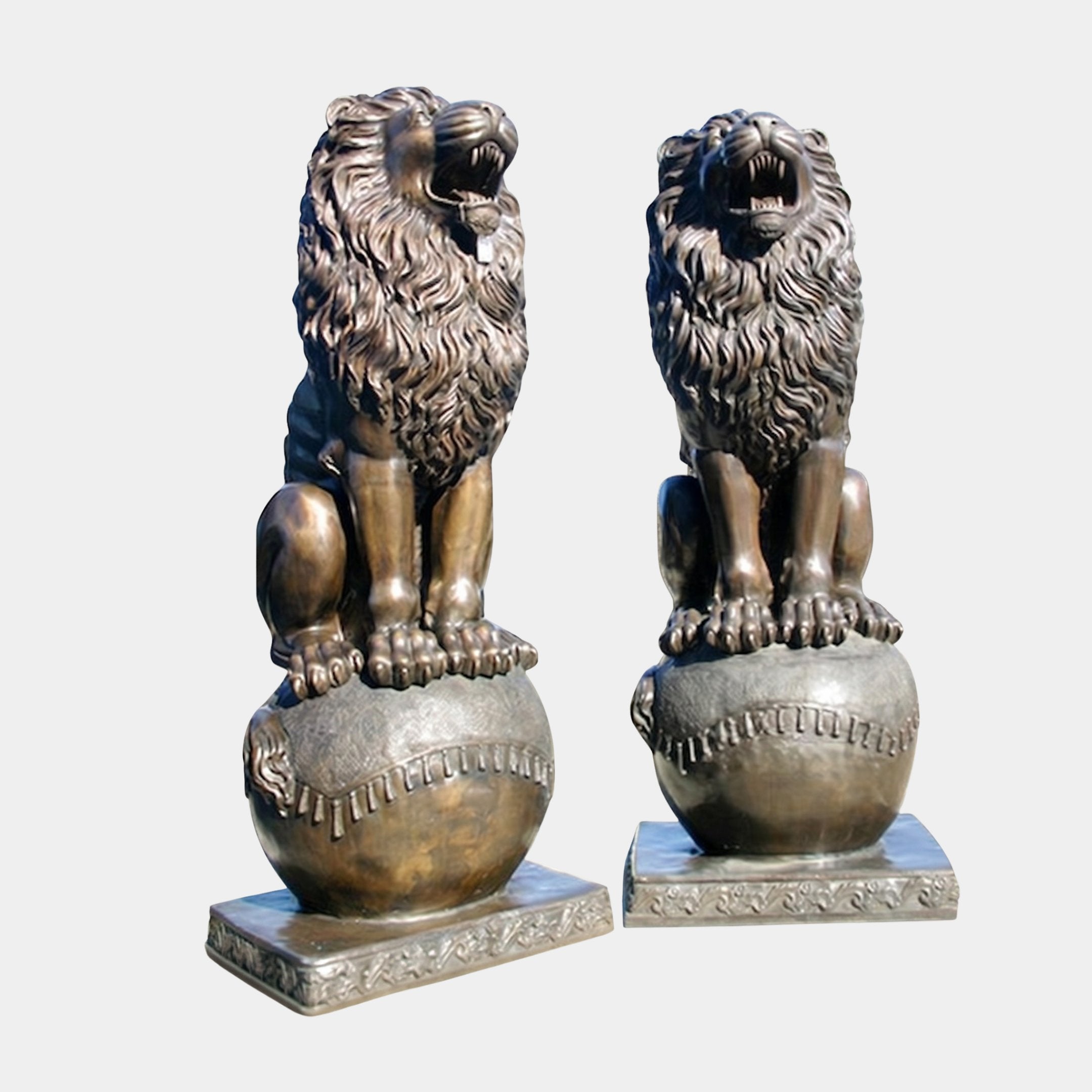 Life-Size Heraldic Roaring Lions Bronze Sculpture Pair by Giant Sculptures, seated upright on decorative spheres atop square plinths in dark antique patina.