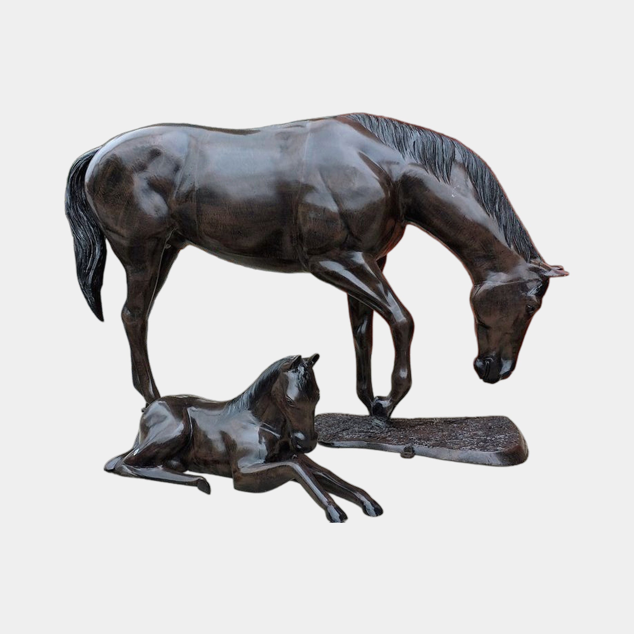 Life-Size Mare and Foal Bronze Sculpture by Giant Sculptures, 170cm, showing a grazing mare with lowered head beside a recumbent foal on a shared base.