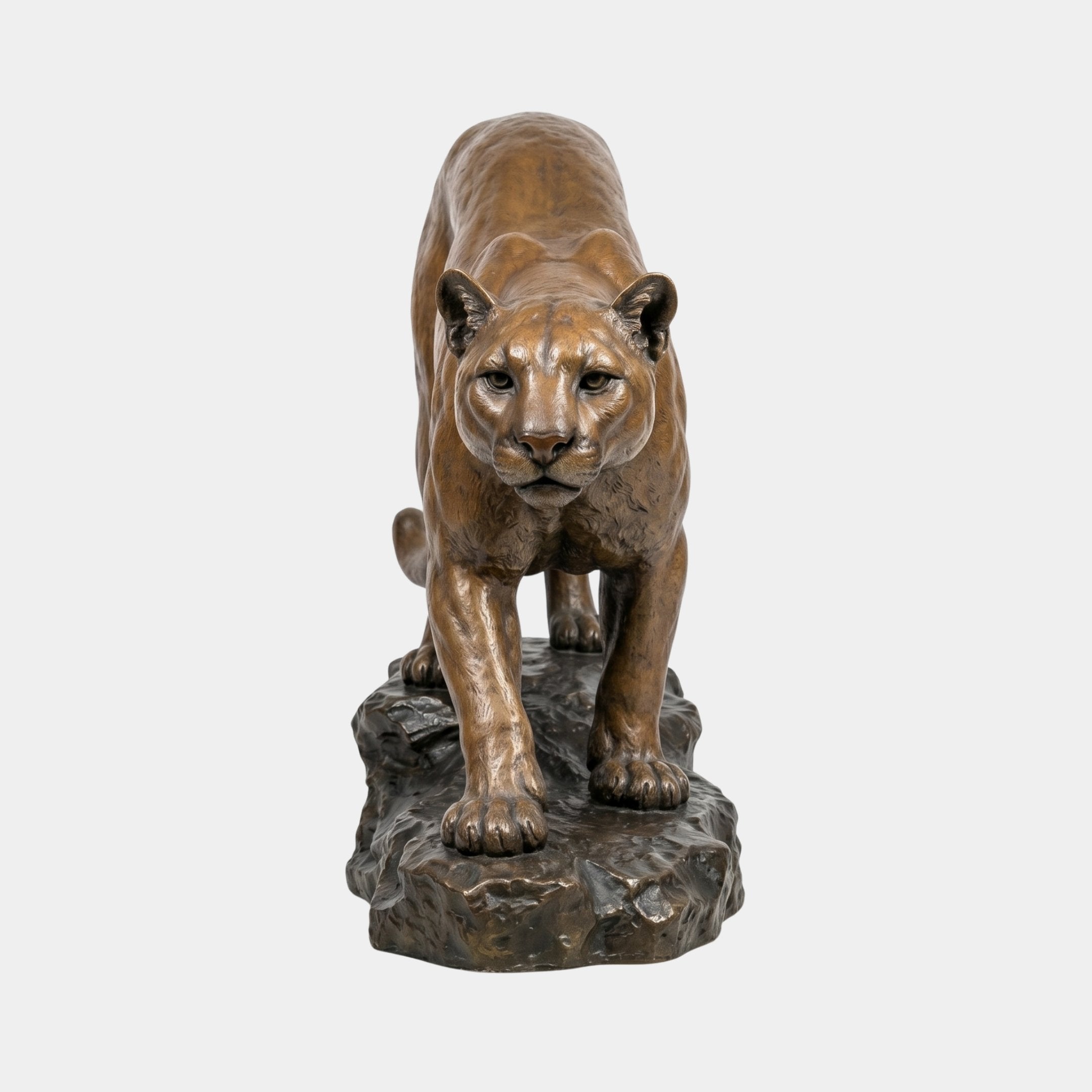 Front view of the Giant Sculptures Life-Size Traditional Crouching Cougar Bronze Sculpture with golden-brown patina on a dark rocky base, plain background.