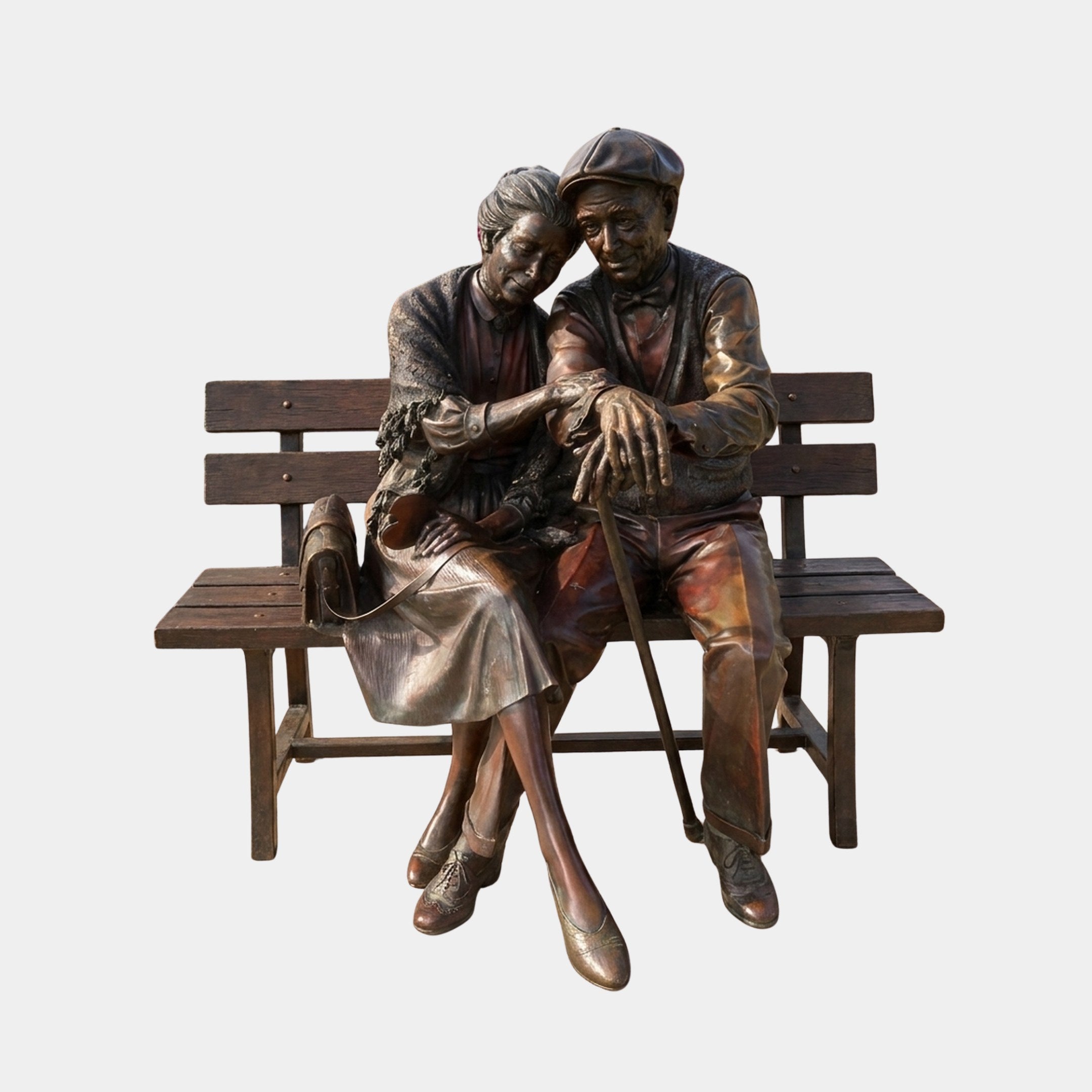 Life-Size Traditional Elderly Couple on Bench Bronze Sculpture 170cm by Giant Sculptures, warm brown patina, woman leaning on man holding a cane.
