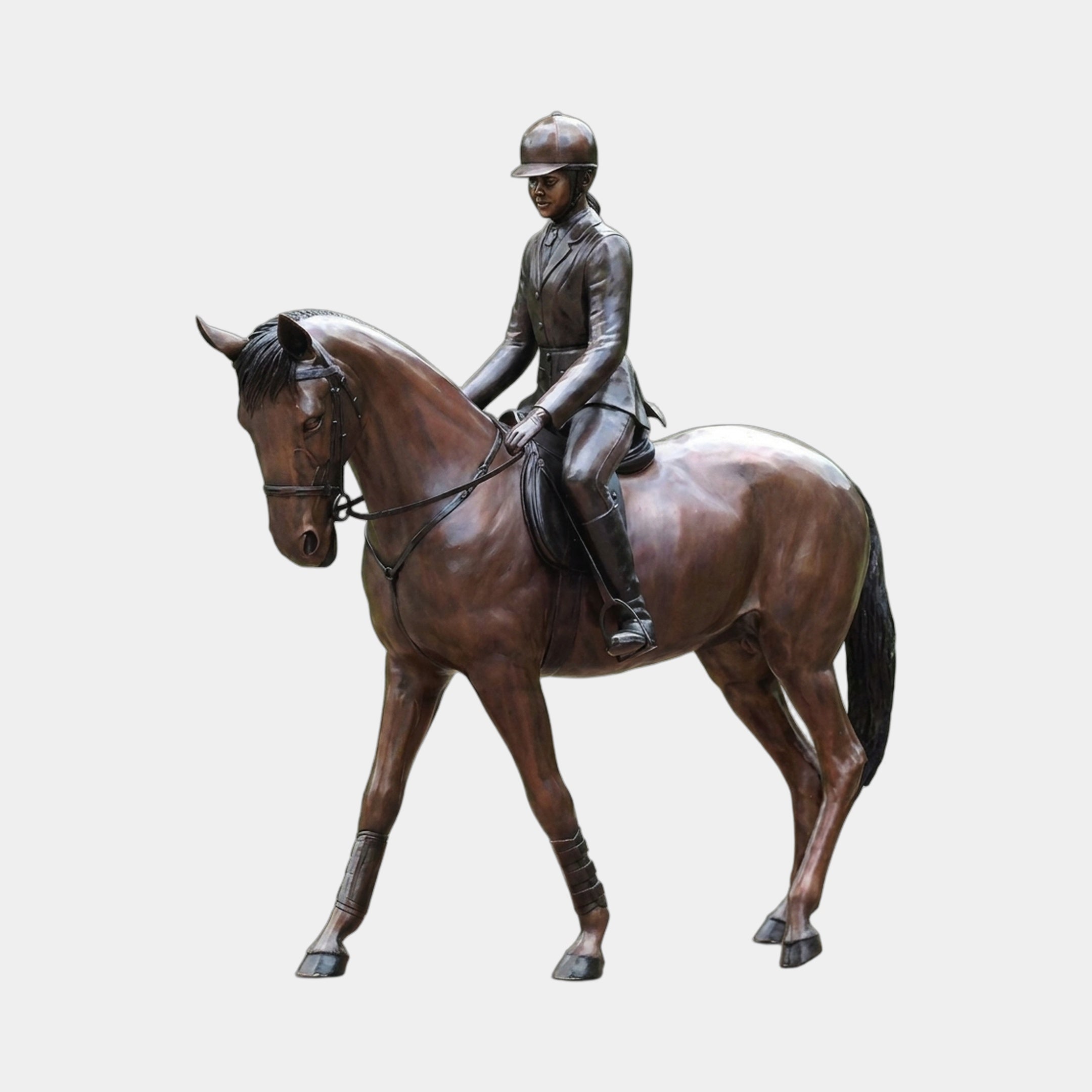 Giant Sculptures' 210cm Life-Size Traditional Female Equestrian Rider and Horse Bronze Sculpture in warm brown patina, horse mid-stride with rider seated upright.