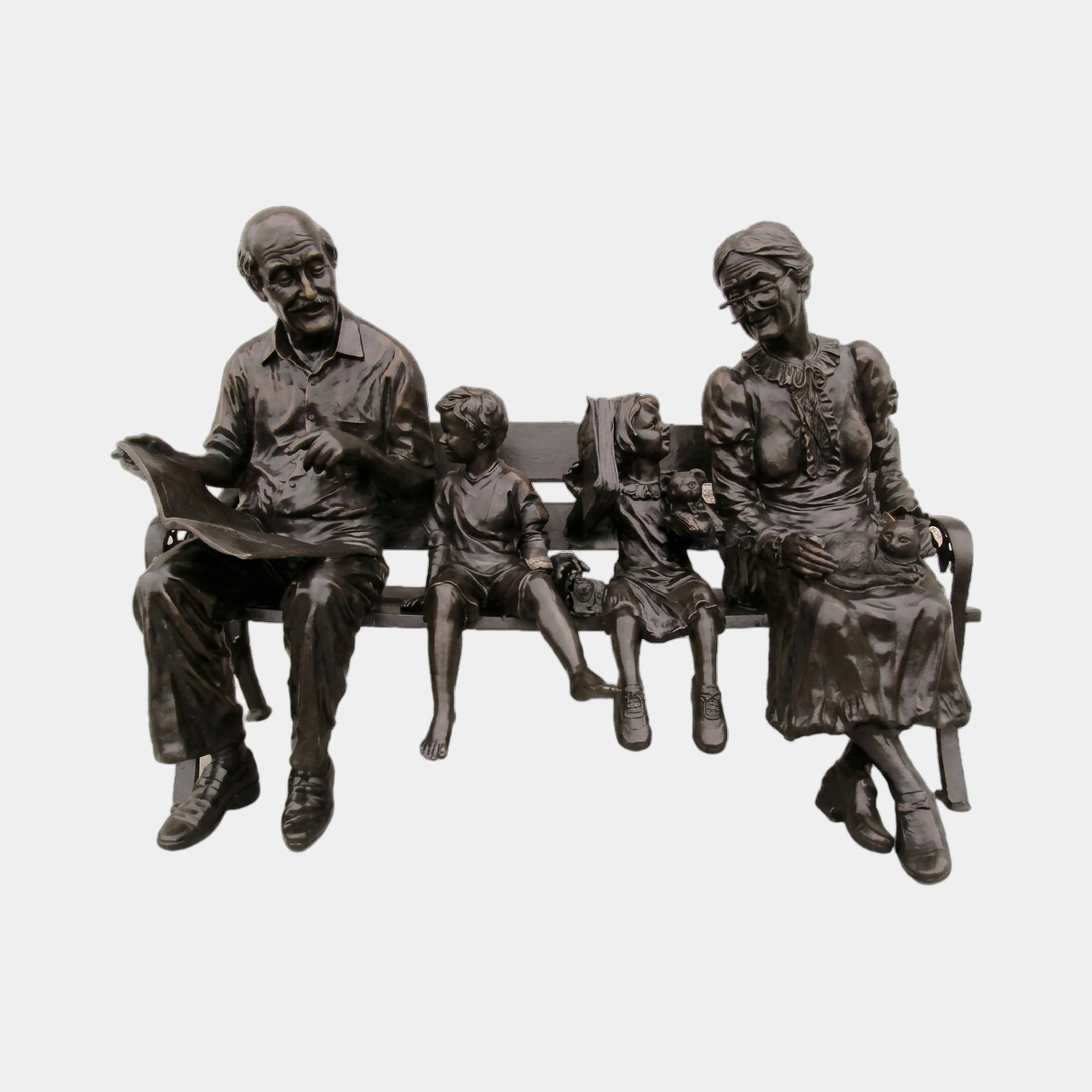 Life-Size Traditional Grandparents and Grandchildren on Bench Bronze Sculpture by Giant Sculptures, dark brown patina, four figures seated together on a slatted bench.