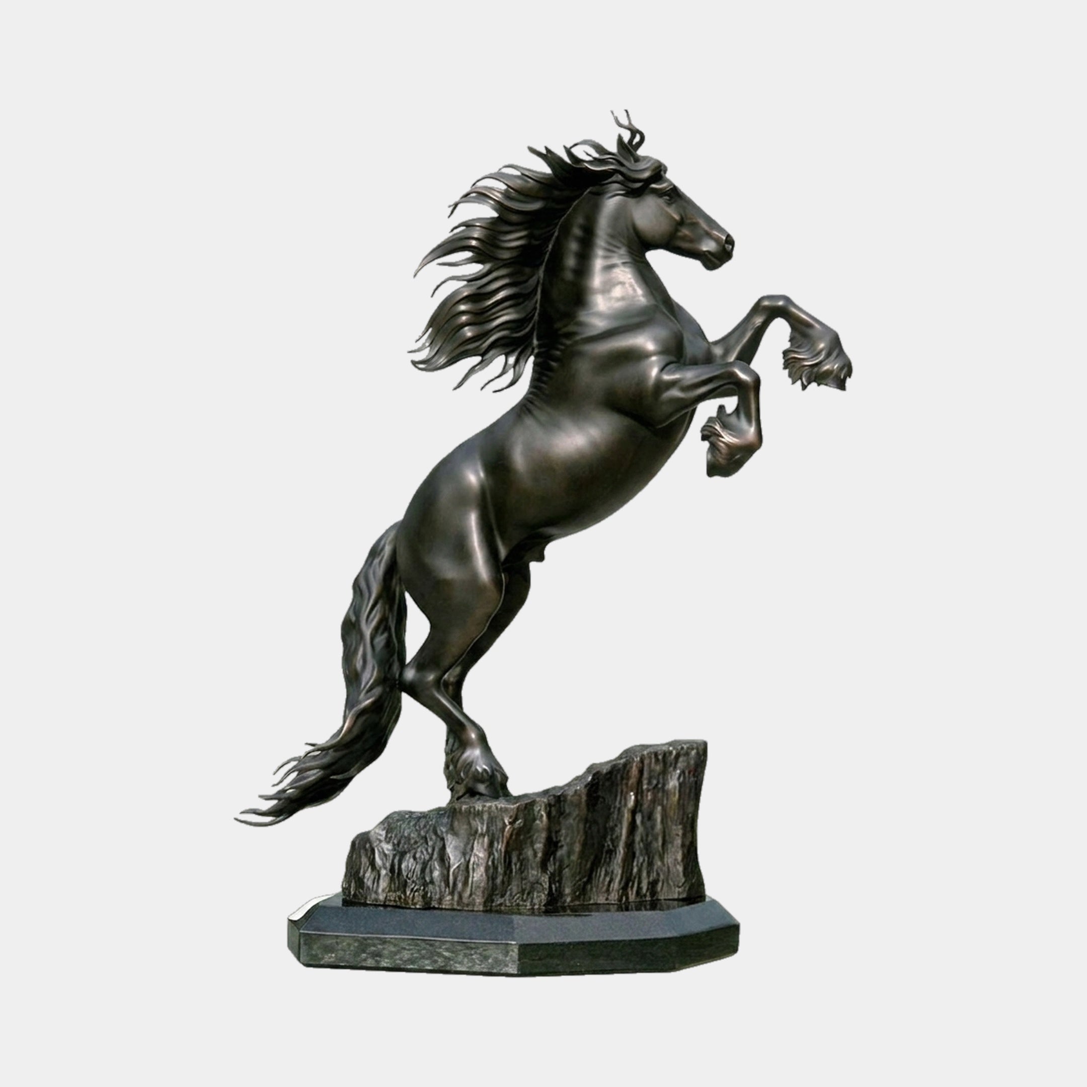 Life-Size Traditional Rearing Horse Bronze Sculpture by Giant Sculptures, dark patina stallion reared on hind legs atop a rocky outcrop base, plain background.