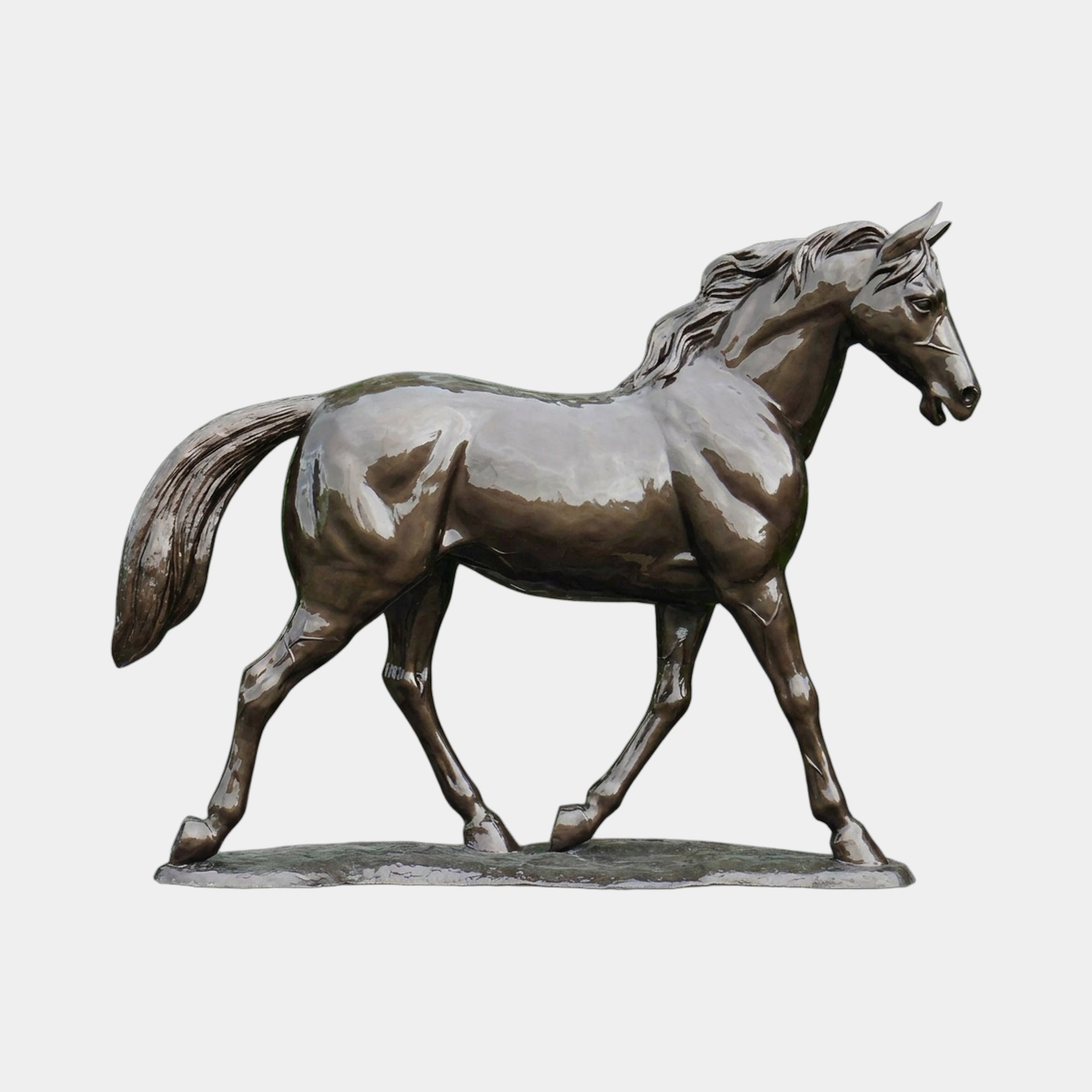 Life-Size Traditional Trotting Horse Bronze Sculpture by Giant Sculptures, 190cm, shown in side profile with raised foreleg and warm brown polished patina.