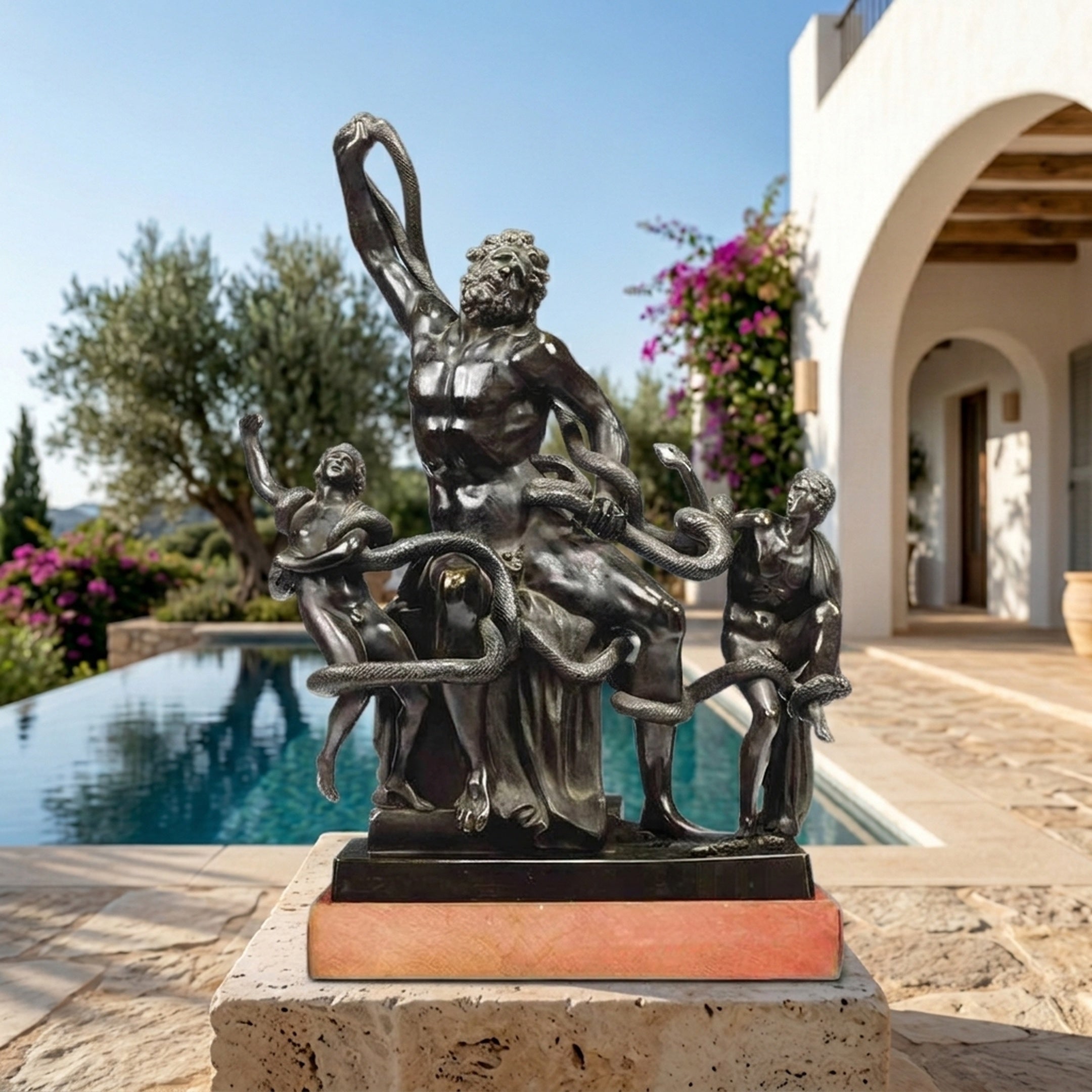 Monumental Classical Laocoön and Sons Bronze Sculpture by Giant Sculptures, dark patinated group entwined with serpents, displayed on a terrace beside a pool.