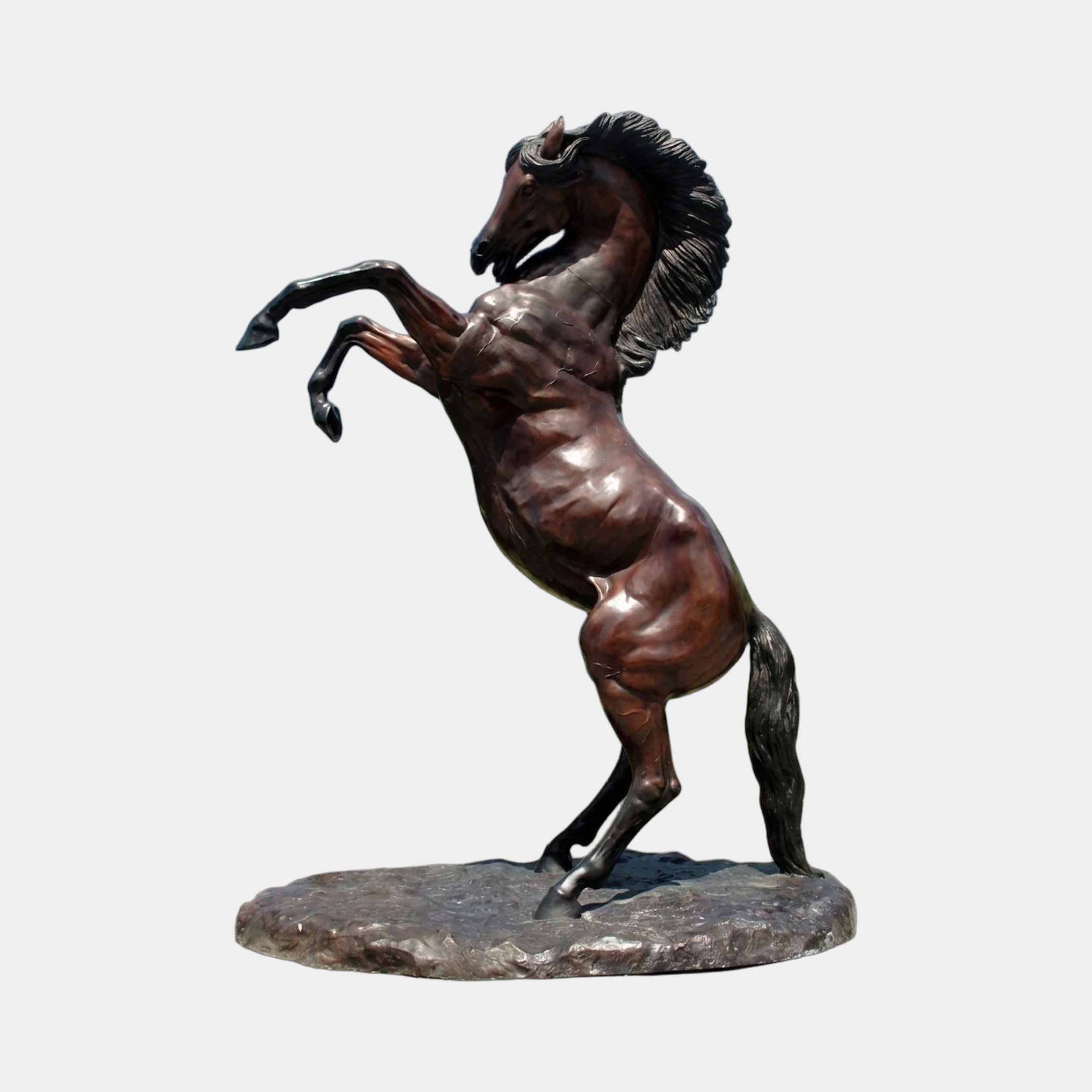 Monumental Classical Rearing Horse Bronze Sculpture by Giant Sculptures, shown rearing on hind legs with flowing mane and tail, on a textured oval base.