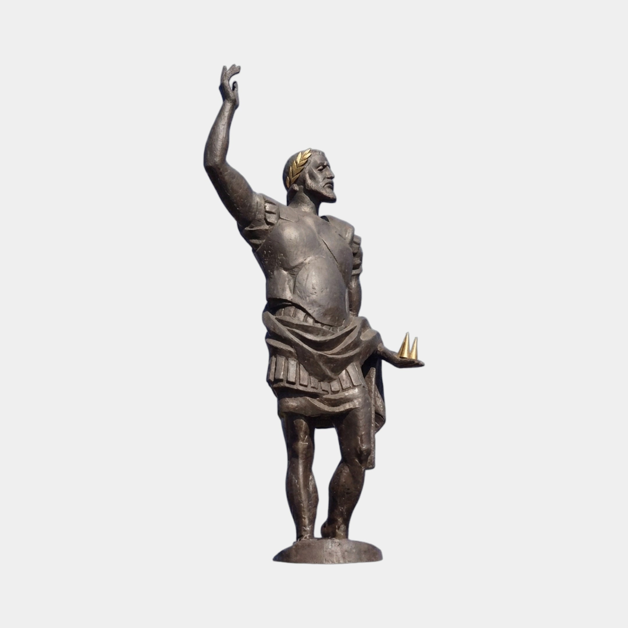 Monumental Classical Roman Warrior Bronze Statue 400cm by Giant Sculptures, armoured figure with gold laurel wreath, raised arm, side view on plain background.