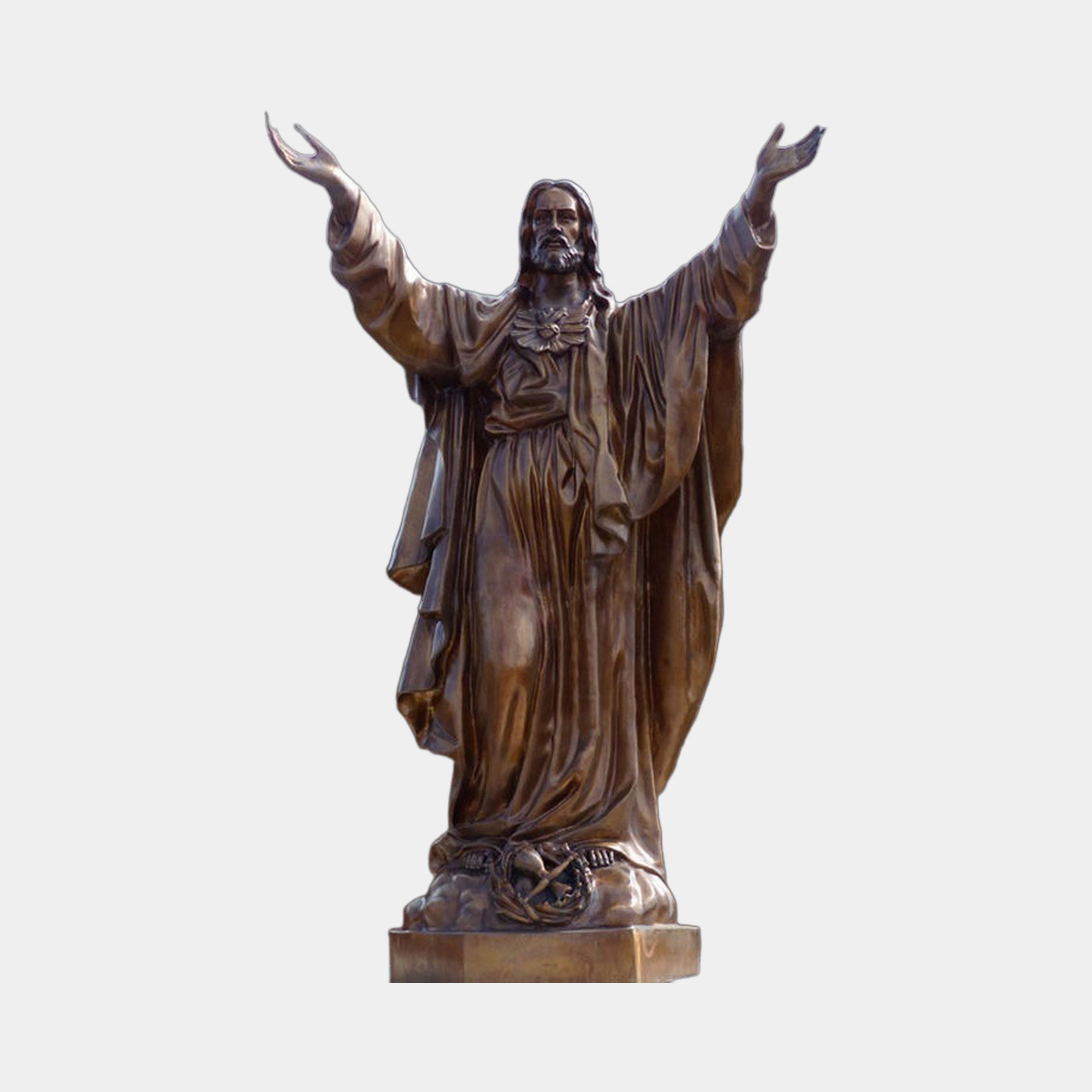 Monumental Classical Sacred Heart Jesus Bronze Statue by Giant Sculptures, arms raised in blessing with golden-brown patina, shown front-on against a plain background.