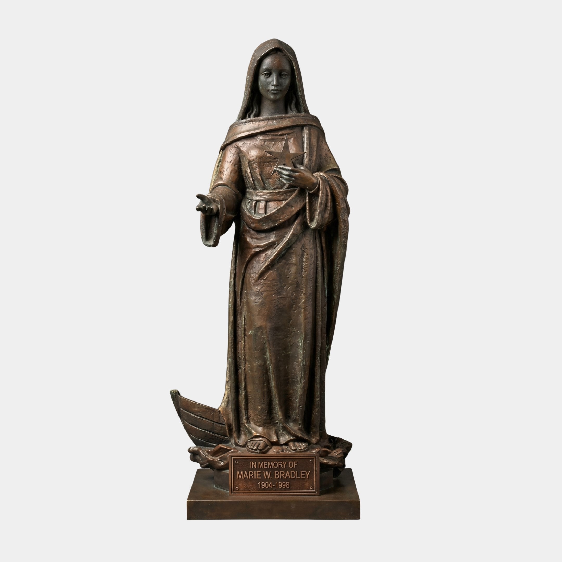 Monumental Classical Standing Virgin Mary Bronze Statue by Giant Sculptures, hooded robed figure with extended hand and star at chest, on plaque-inscribed plinth.
