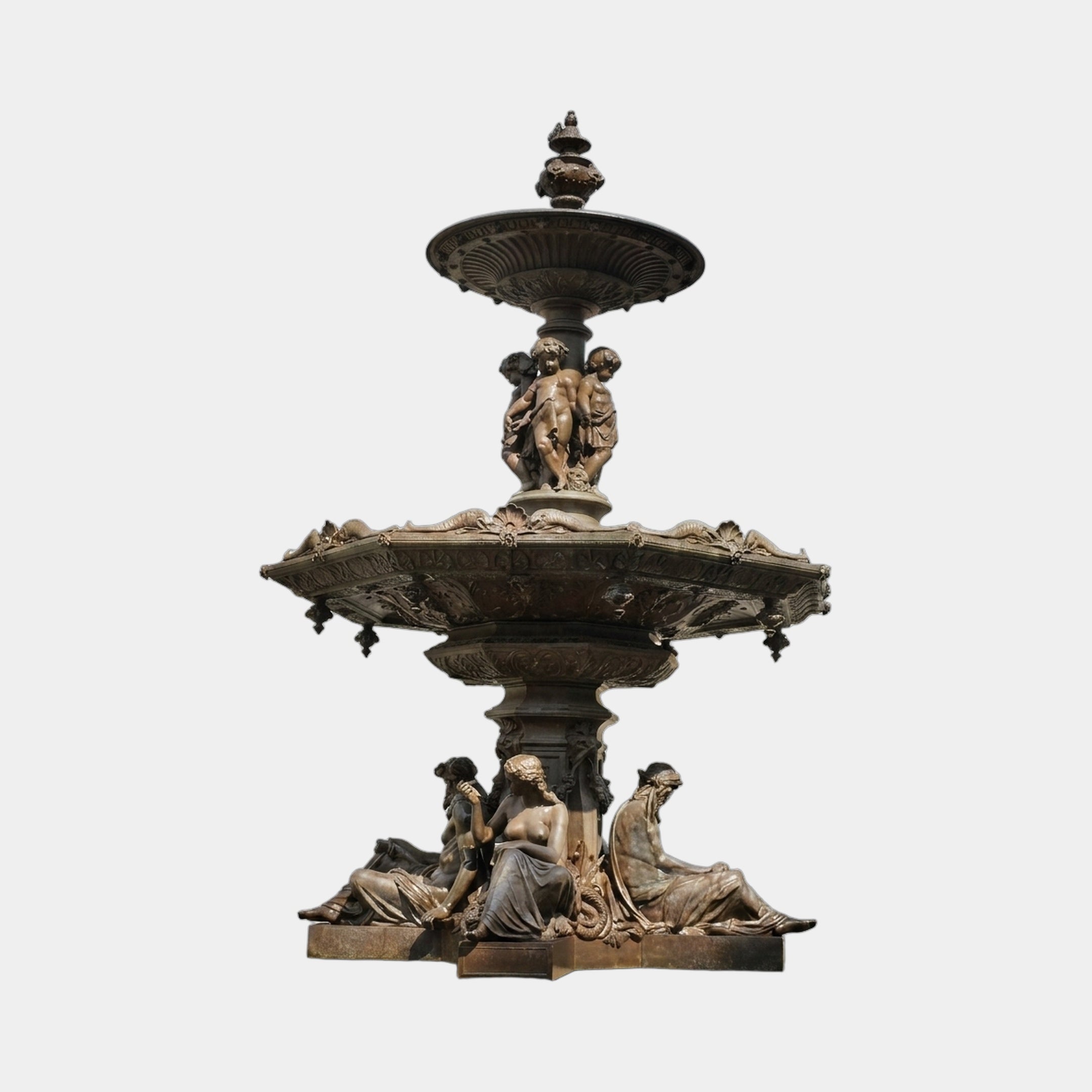 Monumental Classical Tiered Bronze Fountain by Giant Sculptures with reclining draped maidens, cherubs, scalloped basins, and bird finial on a plain background.