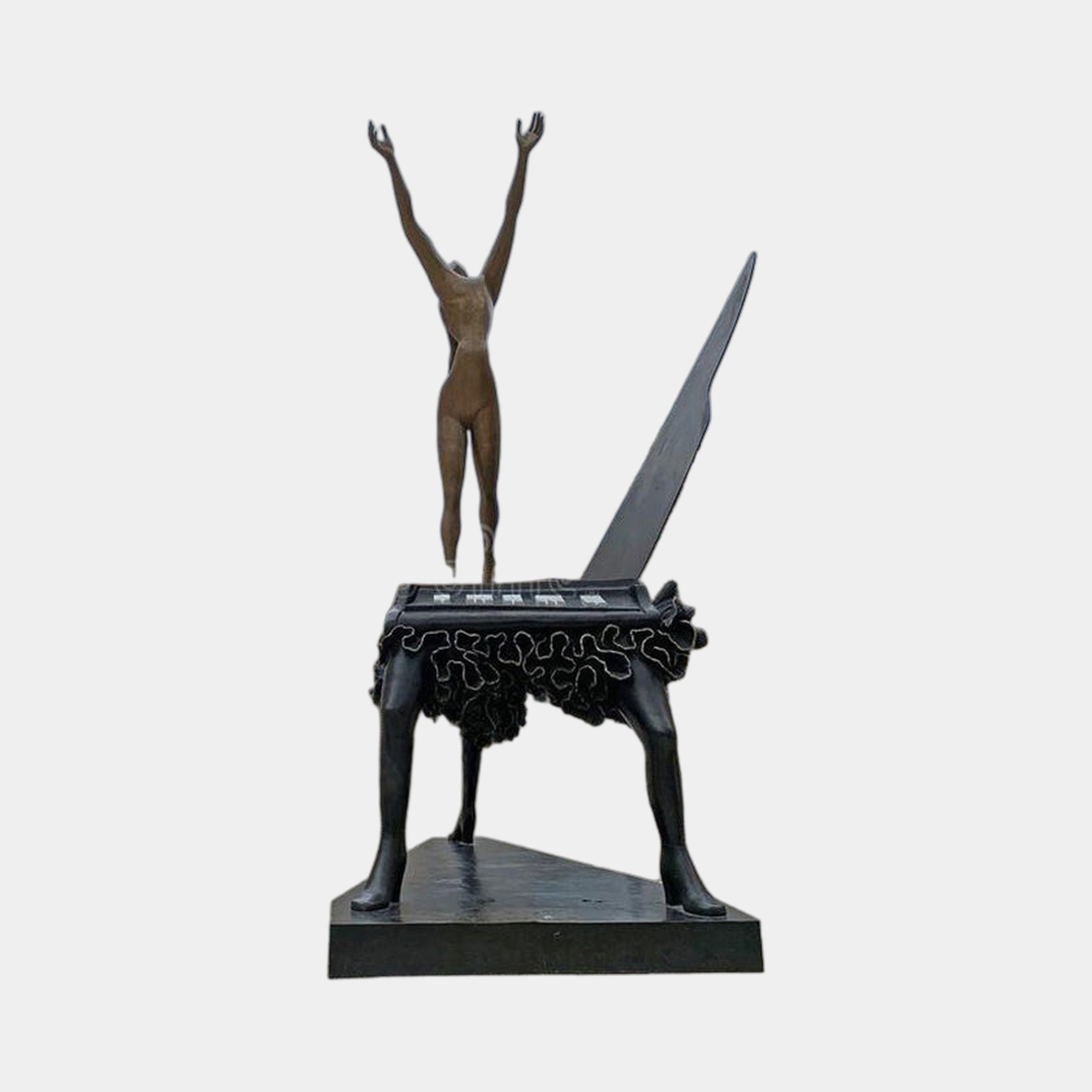 Monumental Contemporary Figure on Grand Piano Bronze Sculpture by Giant Sculptures, brown nude with raised arms atop a black piano on tall spindly legs.