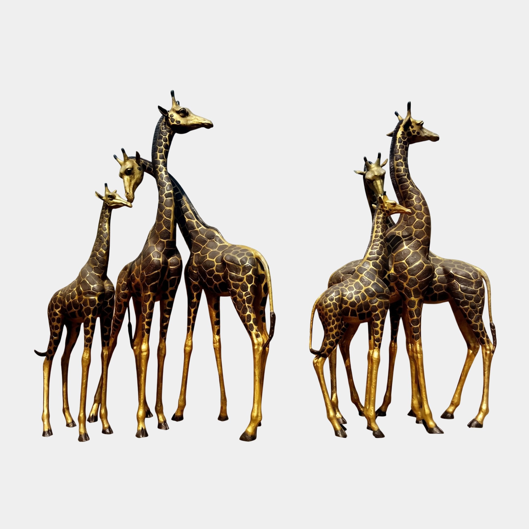 Monumental Herd of Six Giraffes Bronze Sculpture by Giant Sculptures, shown in two groups of three with dark patina and gold-toned markings on a plain background.