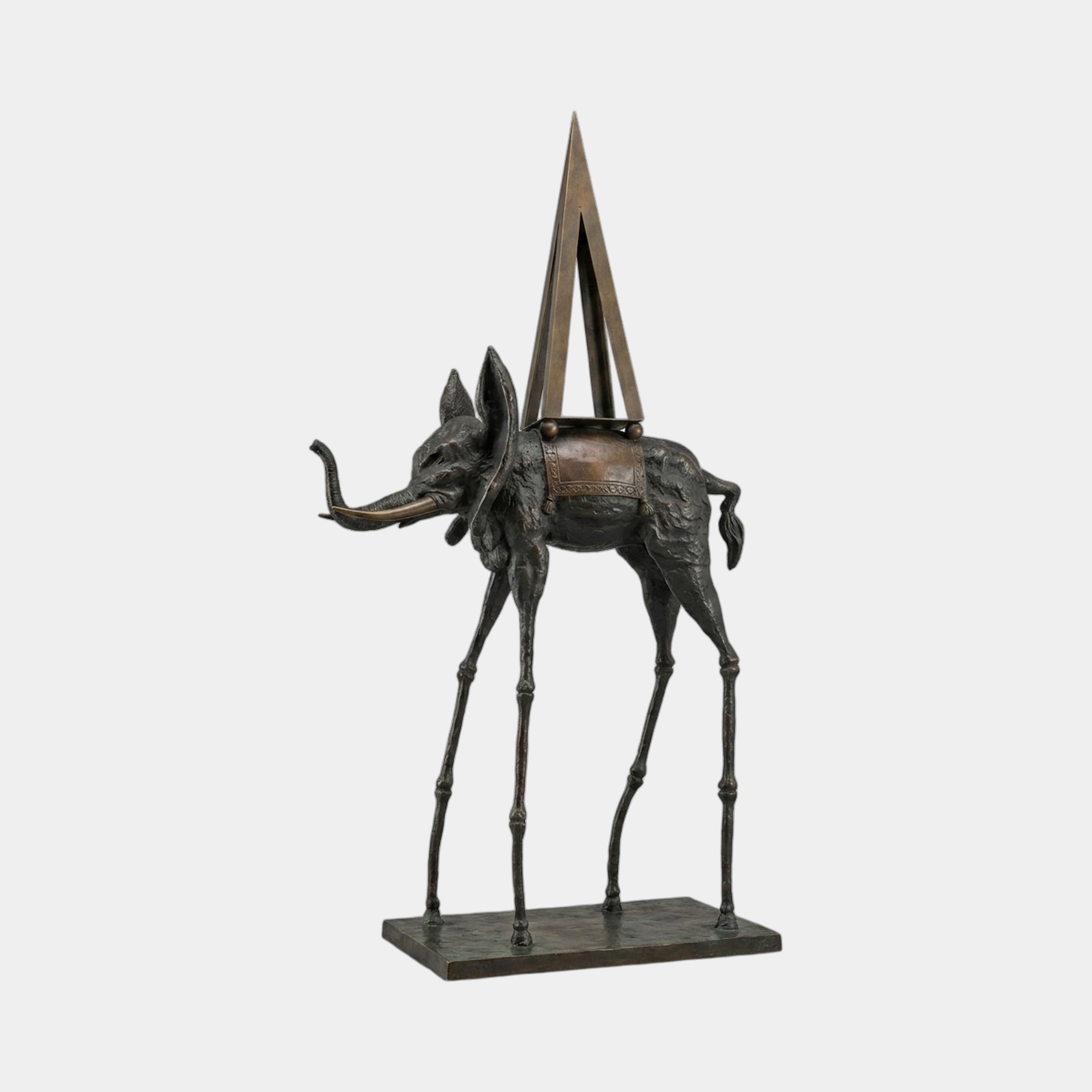 Monumental Contemporary Surrealist Elephant Bronze Sculpture by Giant Sculptures, with elongated spindly legs, raised trunk, and tall triangular obelisk on its back.