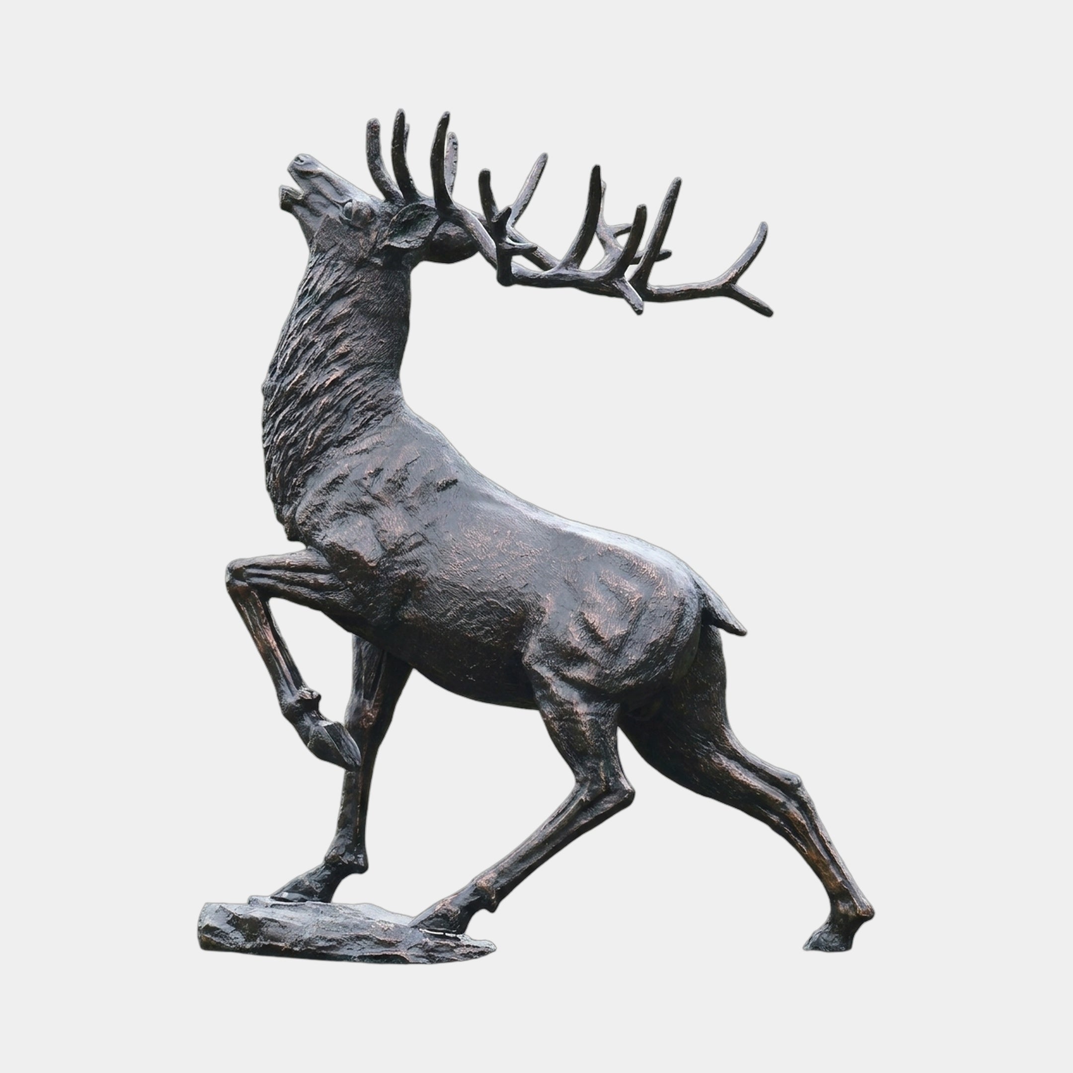 Monumental Rearing Stag Bronze Sculpture by Giant Sculptures shown in side view, rising on hind legs with antlers raised and dark patina, on a rock base.