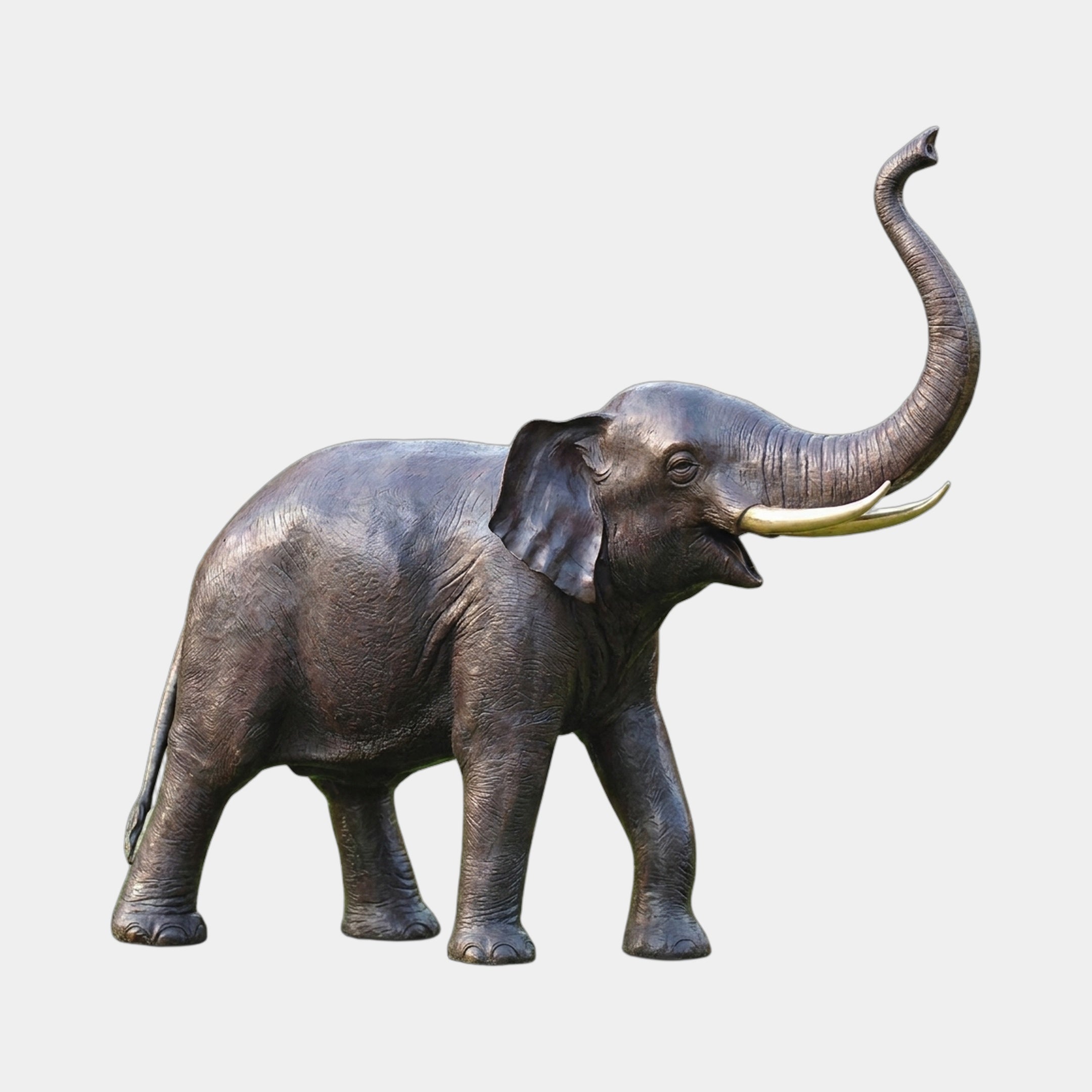 Giant Sculptures Monumental Traditional Standing Elephant Bronze Sculpture 280cm, side view with trunk raised high and pale gold tusks, on plain background.