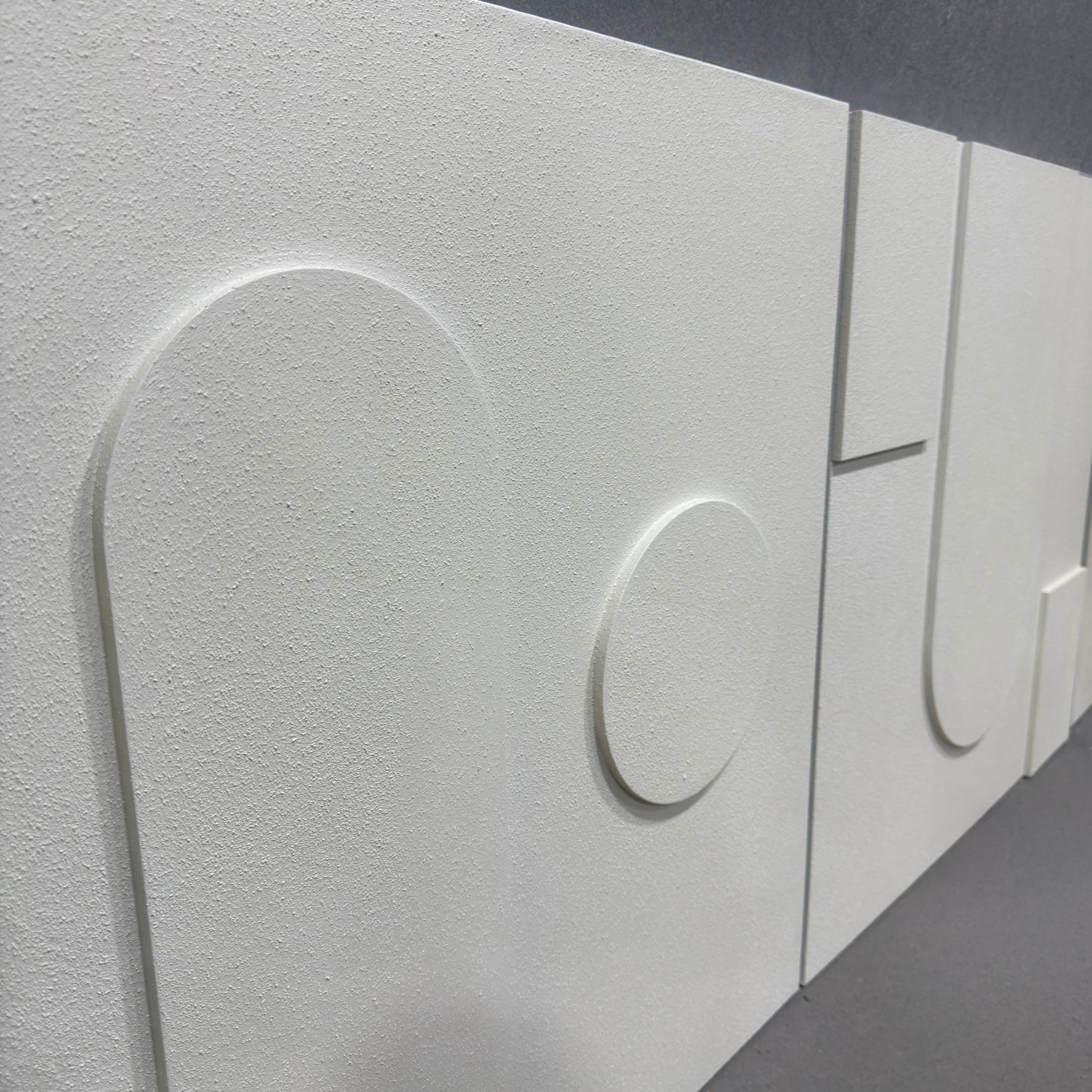 The Moro III Triptych White Relief 3D Wall Art by Giant Sculptures features minimalist geometric shapes in a white textured finish, creating modern, abstract wall decor that adds striking dimension to any neutral space.