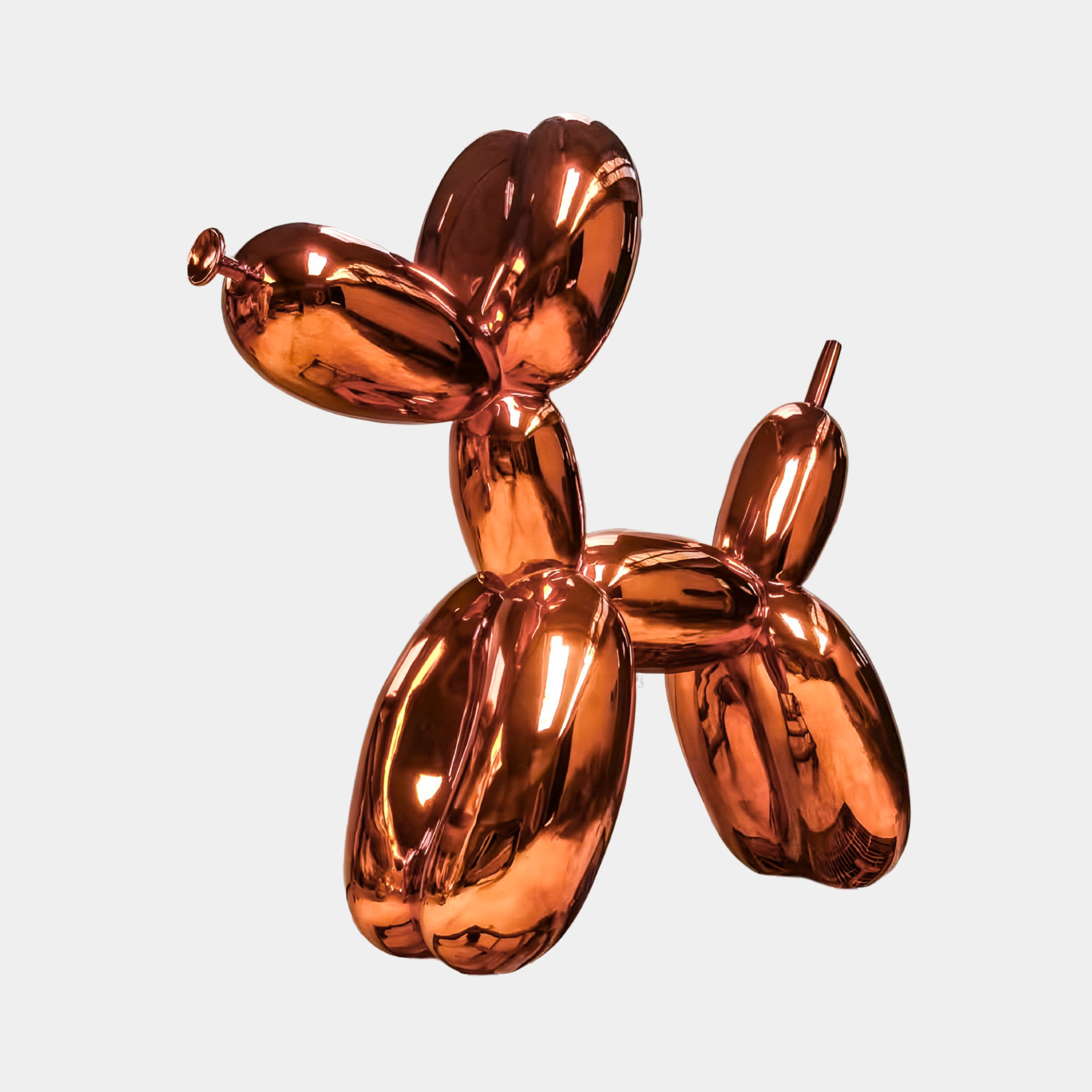 The Giant Sculptures Sunset Orange Balloon Dog Sculpture - 80cm stands against a plain white background, highlighting its vibrant, contemporary modern art appeal.