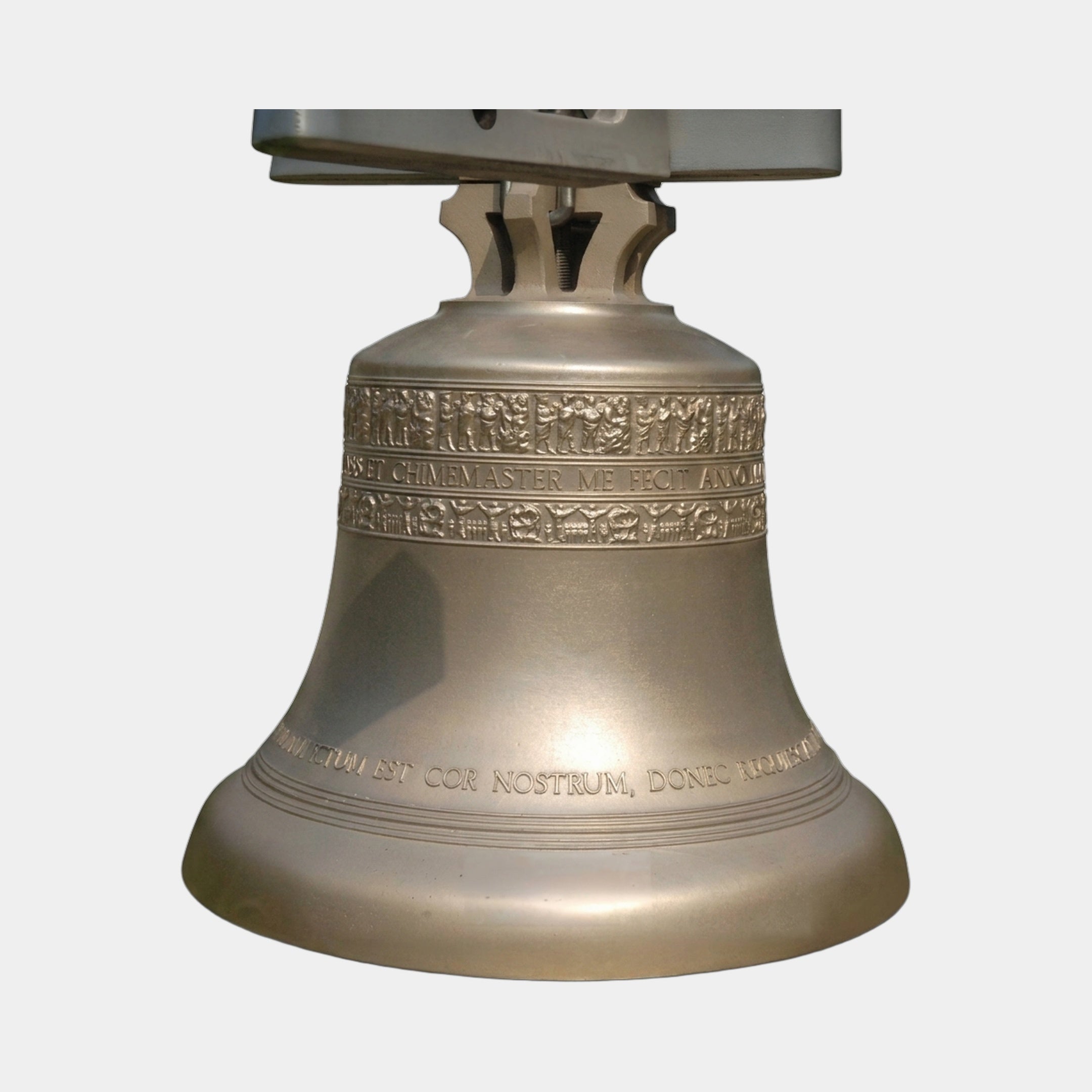 Traditional Church Bell Bronze Sculpture by Giant Sculptures, 100cm cast bronze bell with relief frieze, Latin inscriptions, and metal yoke on a plain background.
