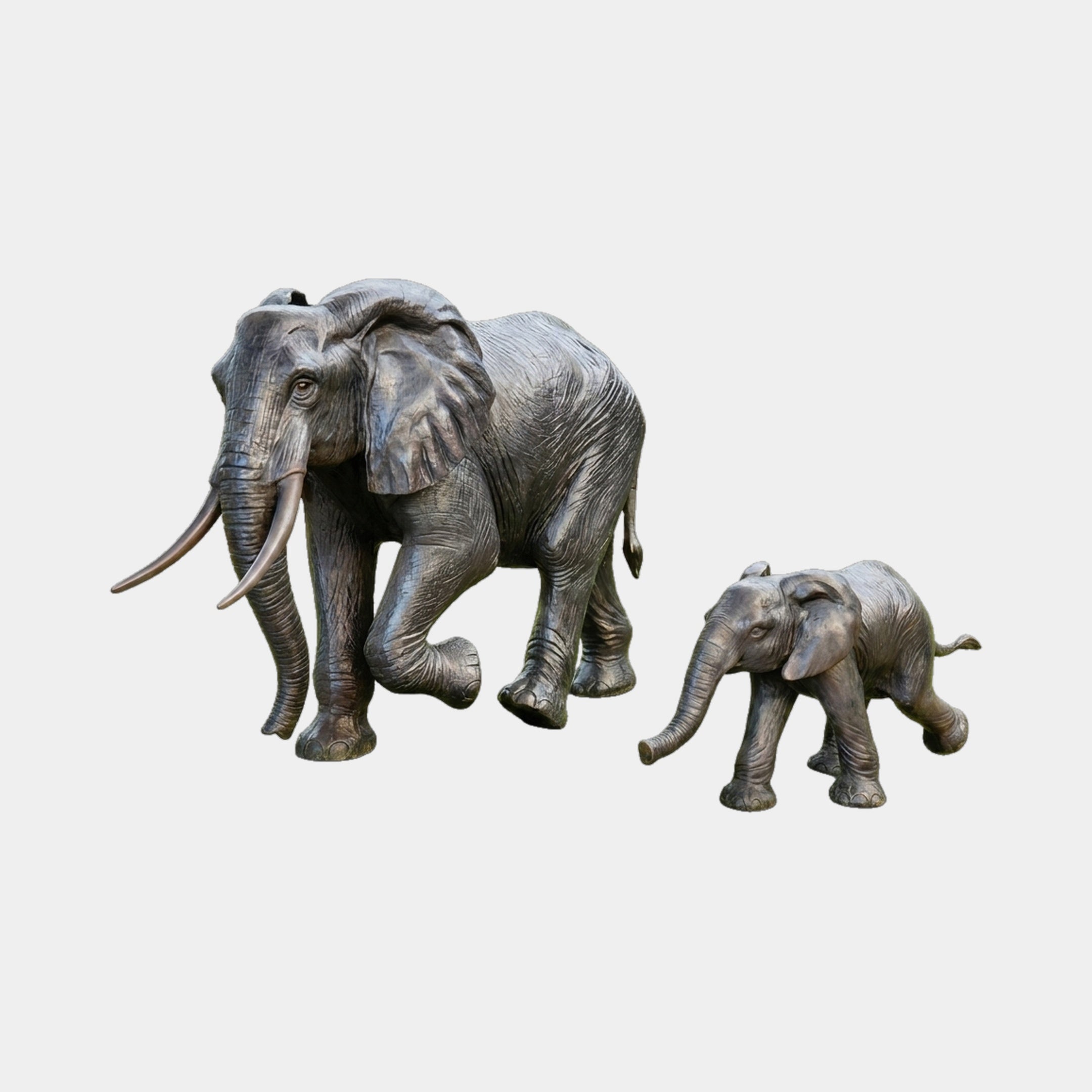 Traditional Elephant Pair Bronze Sculpture (Calf Companion) 110cm by Giant Sculptures, dark patinated adult with pale tusks and calf mid-stride on plain background.