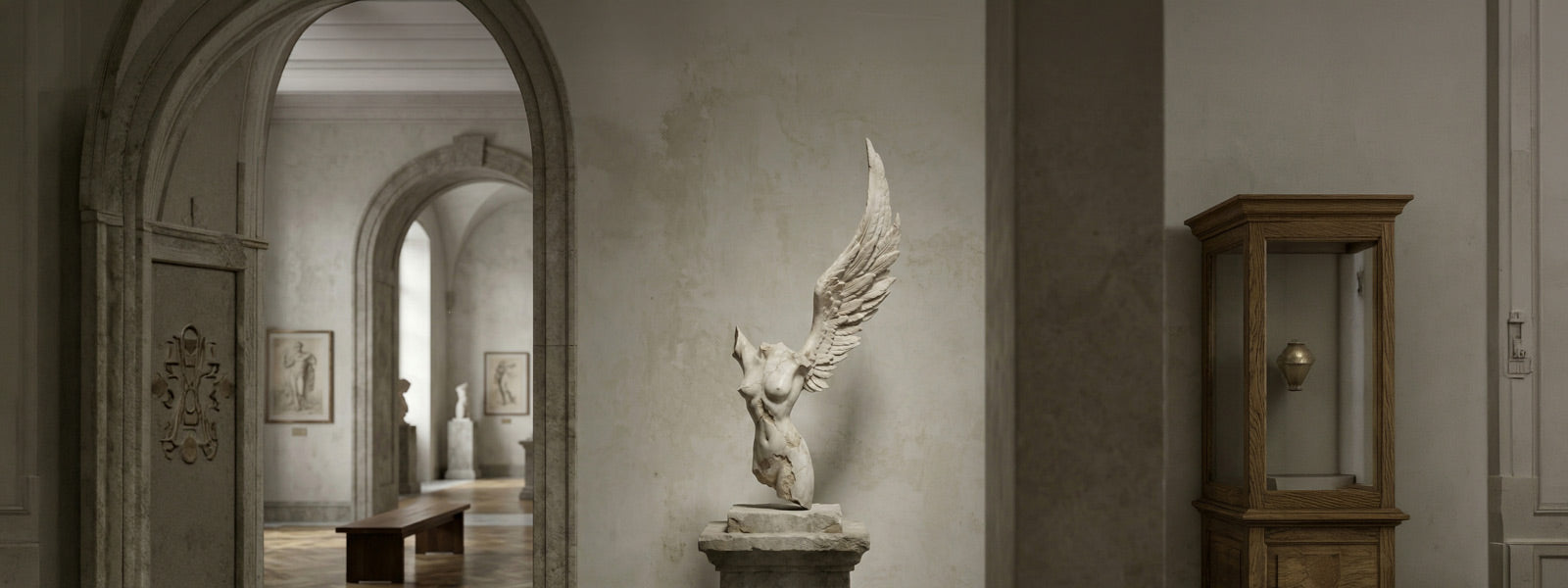 Winged female torso sculpture in light stone on a pedestal inside a classical gallery with arched doorways, muted grey walls, and a wooden display case.