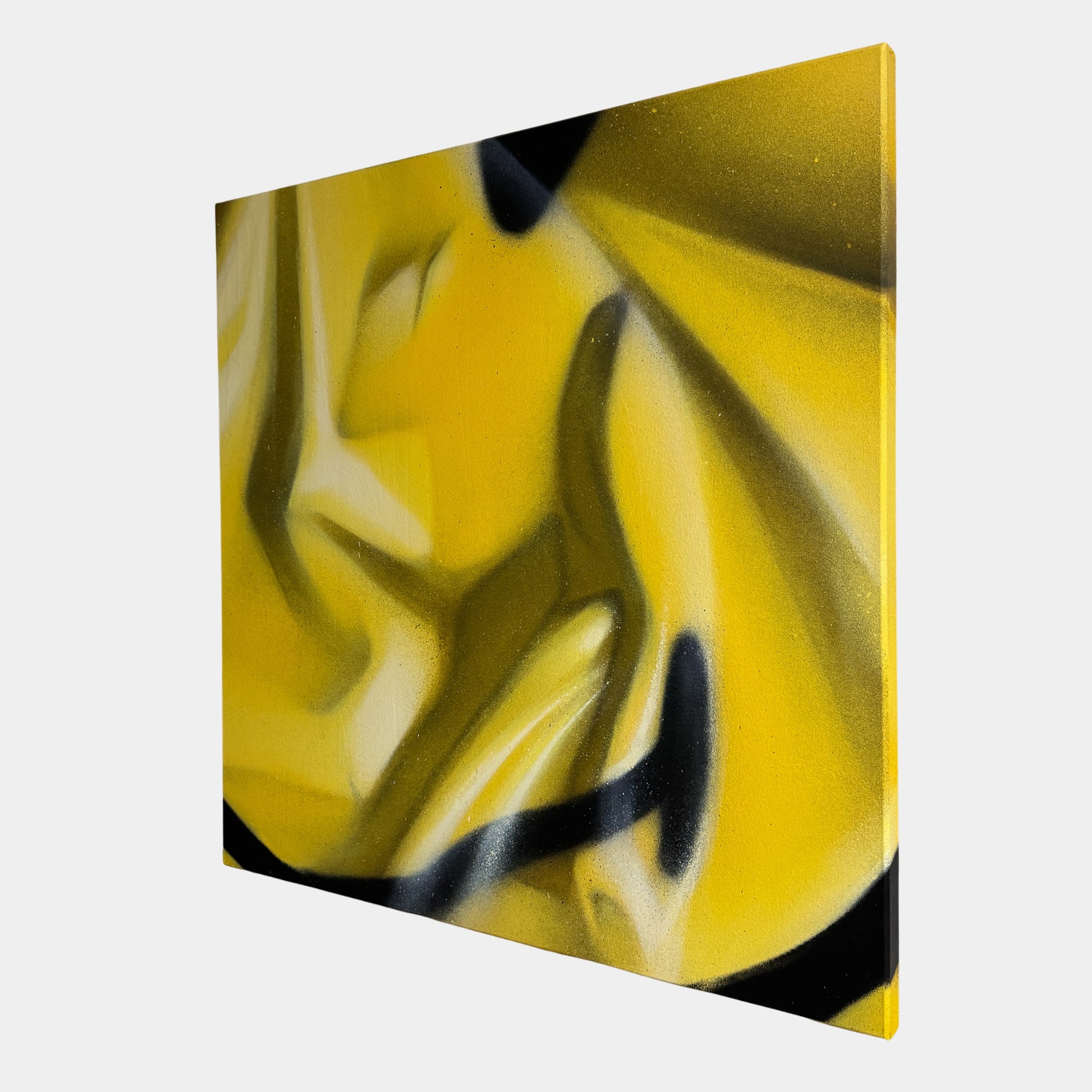 The Smile Fragment Abstract Canvas Wall Art by Giant Sculptures features bold yellow and black graffiti art with sweeping lines and geometric shapes, creating a sense of emotional tension against a plain white background.