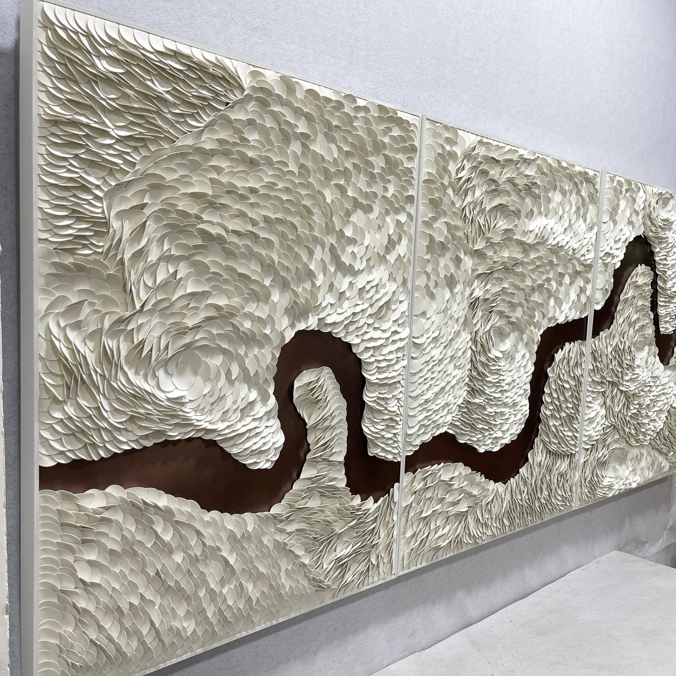 The Riverine Flow Pearl White Textured Triptych Wall Art by Giant Sculptures showcases layered cream and pearl white shapes like feathers or waves, accented by a winding dark brown path through each modern panel.