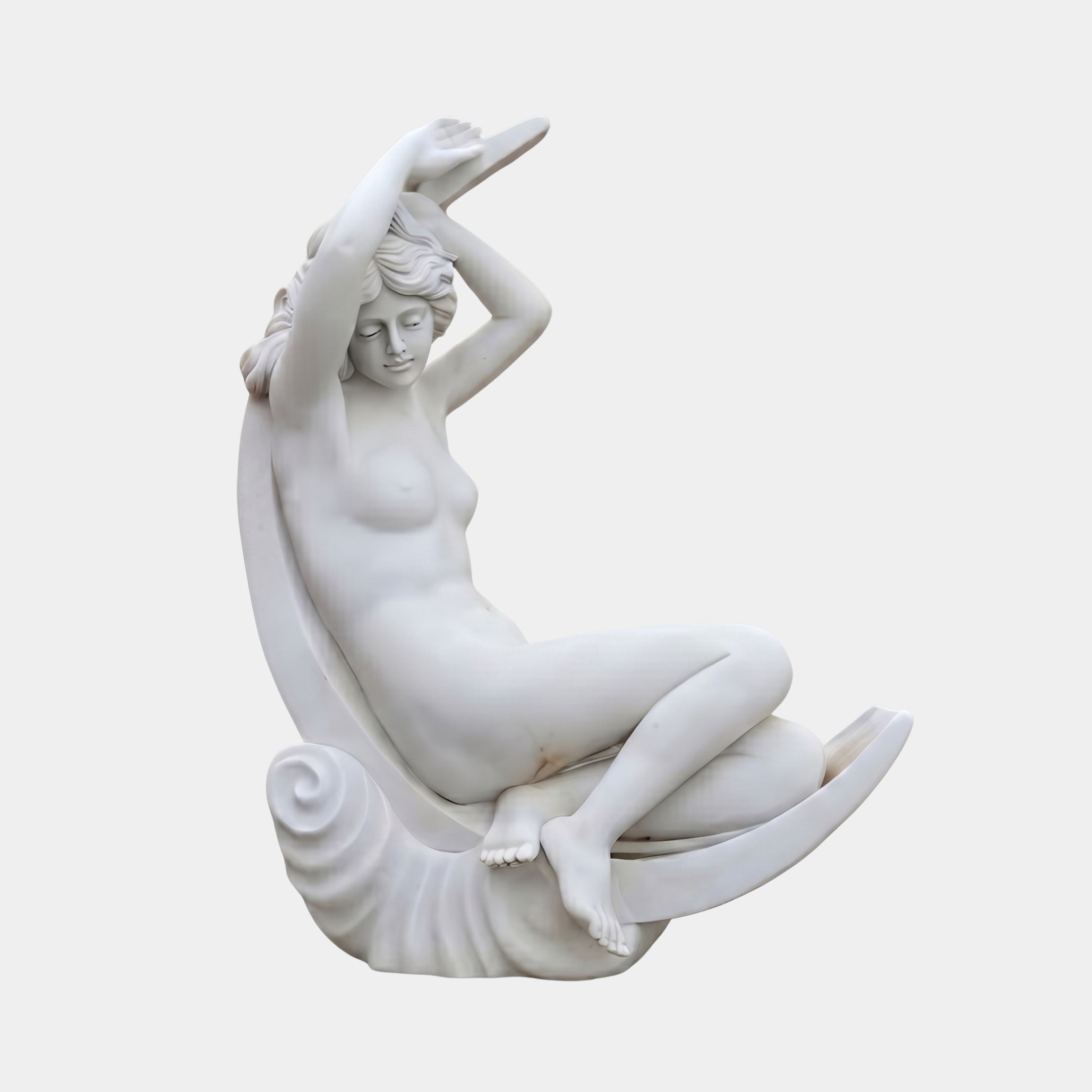 Woman on Crescent Moon Marble Sculpture 80cm by Giant Sculptures, reclining nude figure with arms raised resting within a scrolled crescent, on plain background.