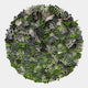 Rivora Green Ribbon Leather Circular 3D Wall Art by Giant Sculptures, dense cluster of wavy green, white, and grey leather ribbons on a plain light background.