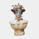 The Medusa Marble Bust Sculpture - 85cm by Giant Sculptures features a hand-carved woman with a snake-adorned headpiece, ornate wings, jewelry, and a leaf-like base. This elegant piece has a pale face and is set against a plain white background.