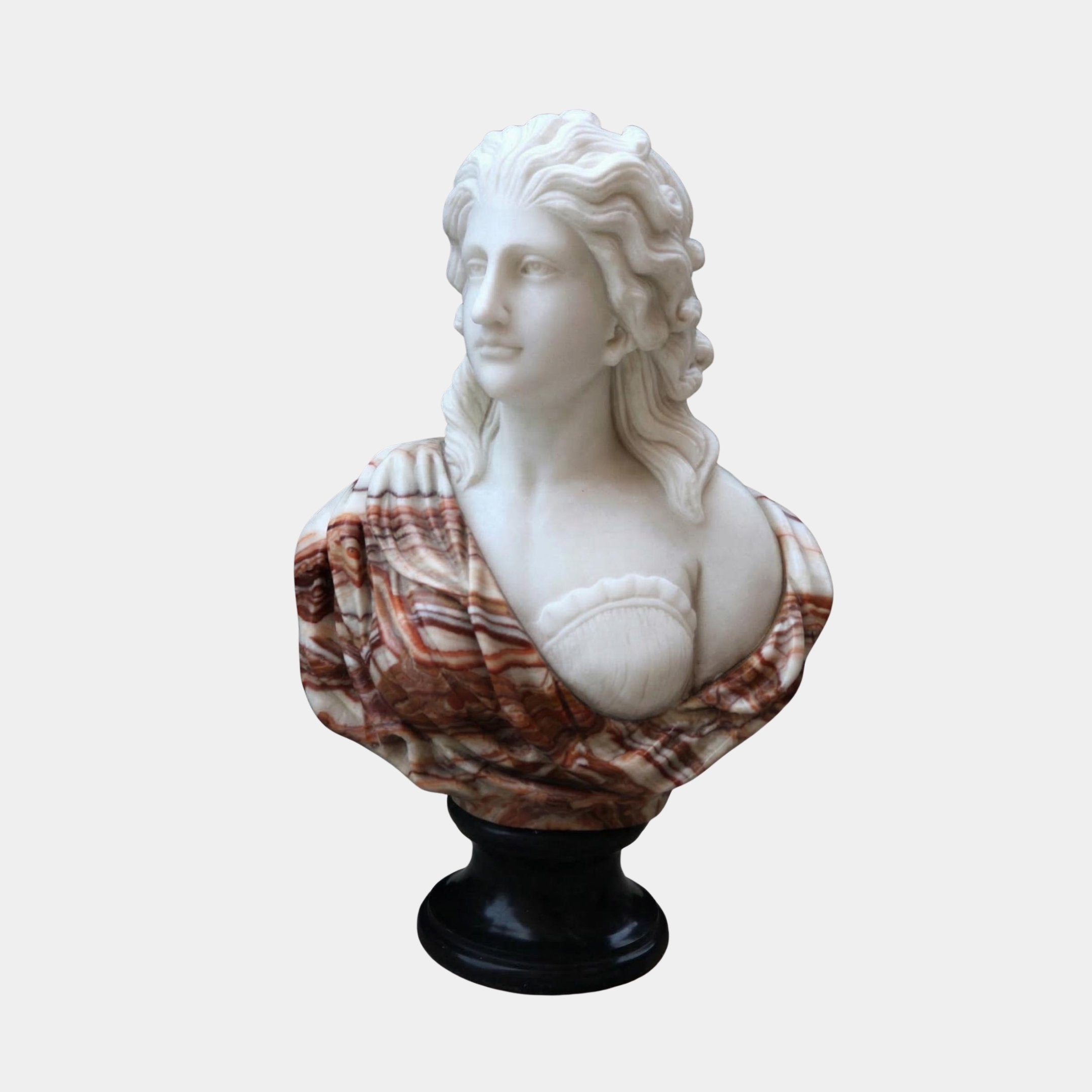 The Giant Sculptures Venus Marble Bust Sculpture - 75cm features a woman with wavy hair in a multicolored garment, holding a shell-shaped object to her chest. Mounted on a black pedestal, it stands out against a plain background.