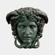 The Medusa Marble Head Sculpture (65cm) by Giant Sculptures features a dark Greek mythology design with snakes entwined in her hair, one missing eye, and detailed snake scales set against a plain background.