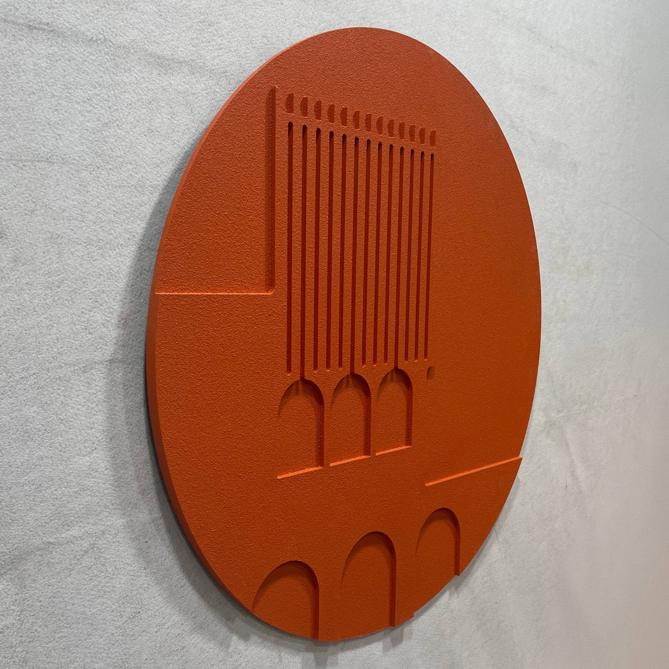 Arcuza Terracotta I Wood Carving Sandstone 3D Wall Art shown at an angle, with vertical fluted slats and recessed arches carved into the matte terracotta oval.