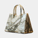 Giant Sculptures 40cm tote bag sculpture carved from Carrara marble with grey veining and twin rolled handles, shown at an angle on a plain background.