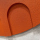 Close-up of the Arcuza Terracotta I Wood Carving Sandstone 3D Wall Art by Giant Sculptures, showing the carved arched recess and matte terracotta textured finish.