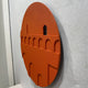 Angled side view of the Arcuza Terracotta II Wood Carving Sandstone 3D Wall Art, showing the carved arches and offset window cut-out against a light grey wall.