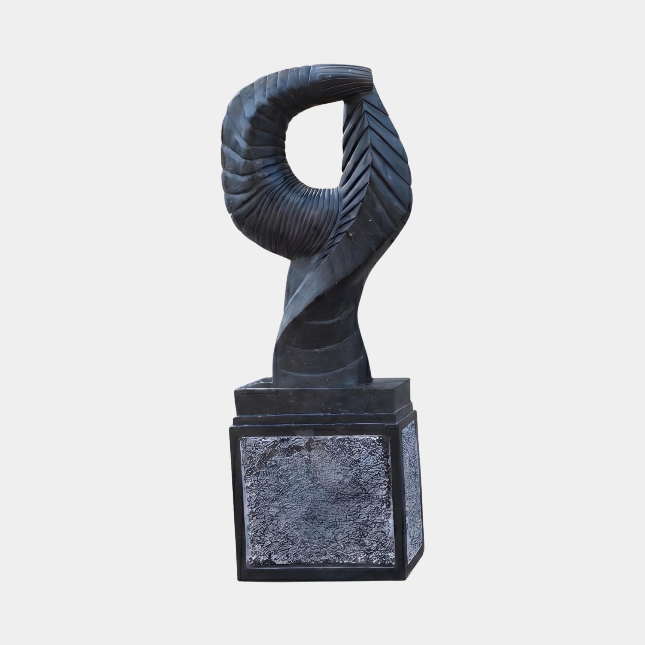 Abstract Folded Form Marble Sculpture by Giant Sculptures, 80cm tall, with a looped, ribbed black marble top on a textured square base, shown against a plain background.