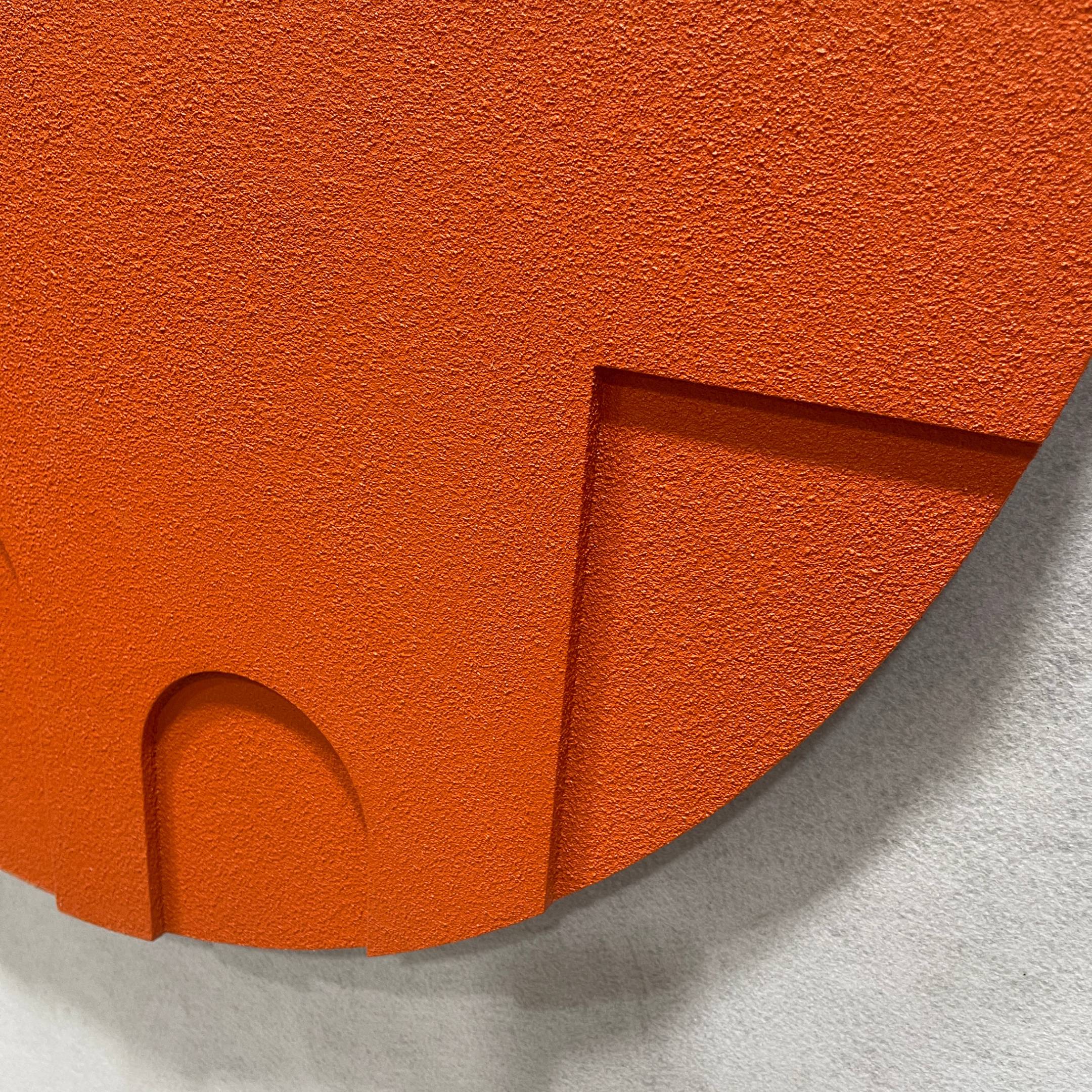 Close-up of the Arcuza Terracotta II Wood Carving Sandstone 3D Wall Art by Giant Sculptures, showing the matte terracotta textured surface with a recessed square cut-out and small arched niche.