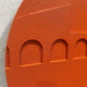 Close-up of the Giant Sculptures Arcuza Terracotta II Wood Carving Sandstone 3D Wall Art showing hand-carved recessed arches in a matte terracotta finish.