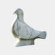 The Pure Grace Dove Marble Outdoor Sculpture by Giant Sculptures is a 50cm piece featuring a stylized dove with smooth, rounded shapes and minimalistic details on a plain background.