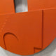 Close-up detail of the Arcuza Terracotta III Wood Carving Sandstone 3D Wall Art showing the textured matte terracotta surface, layered panels, and arched cut-out.