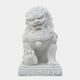 The Chinese Guardian Lion Marble Outdoor Sculpture by Giant Sculptures stands 150cm tall with intricate carving in white marble. It features a detailed mane, fierce expression, and a paw on a decorated ball, serving as a traditional protector against evil spirits for outdoor spaces.