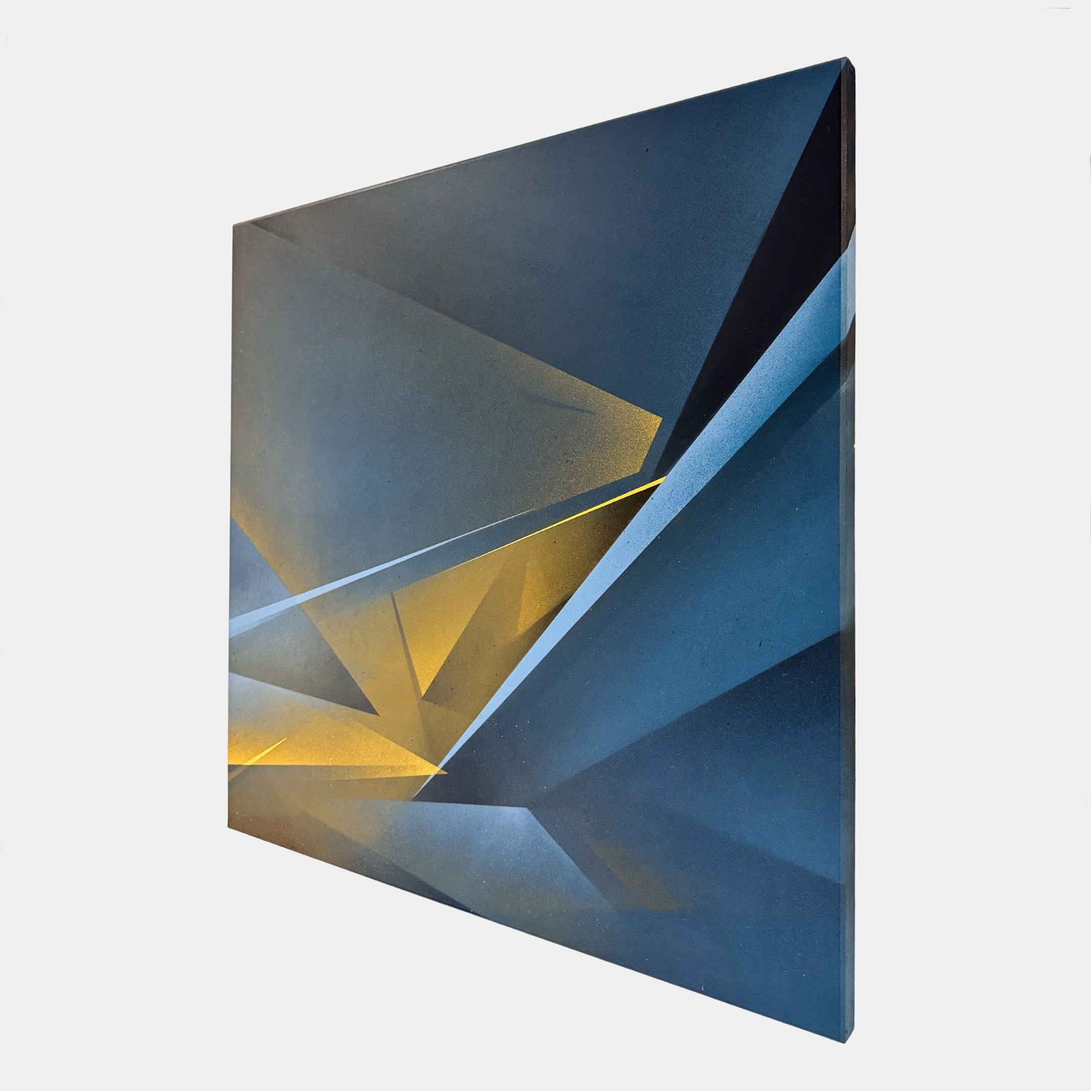 The Skull&Stone I Abstract Canvas Wall Art by Giant Sculptures showcases an abstract geometric design with bold blue and yellow angles, viewed from the side against a white background—a striking limited edition decor piece.