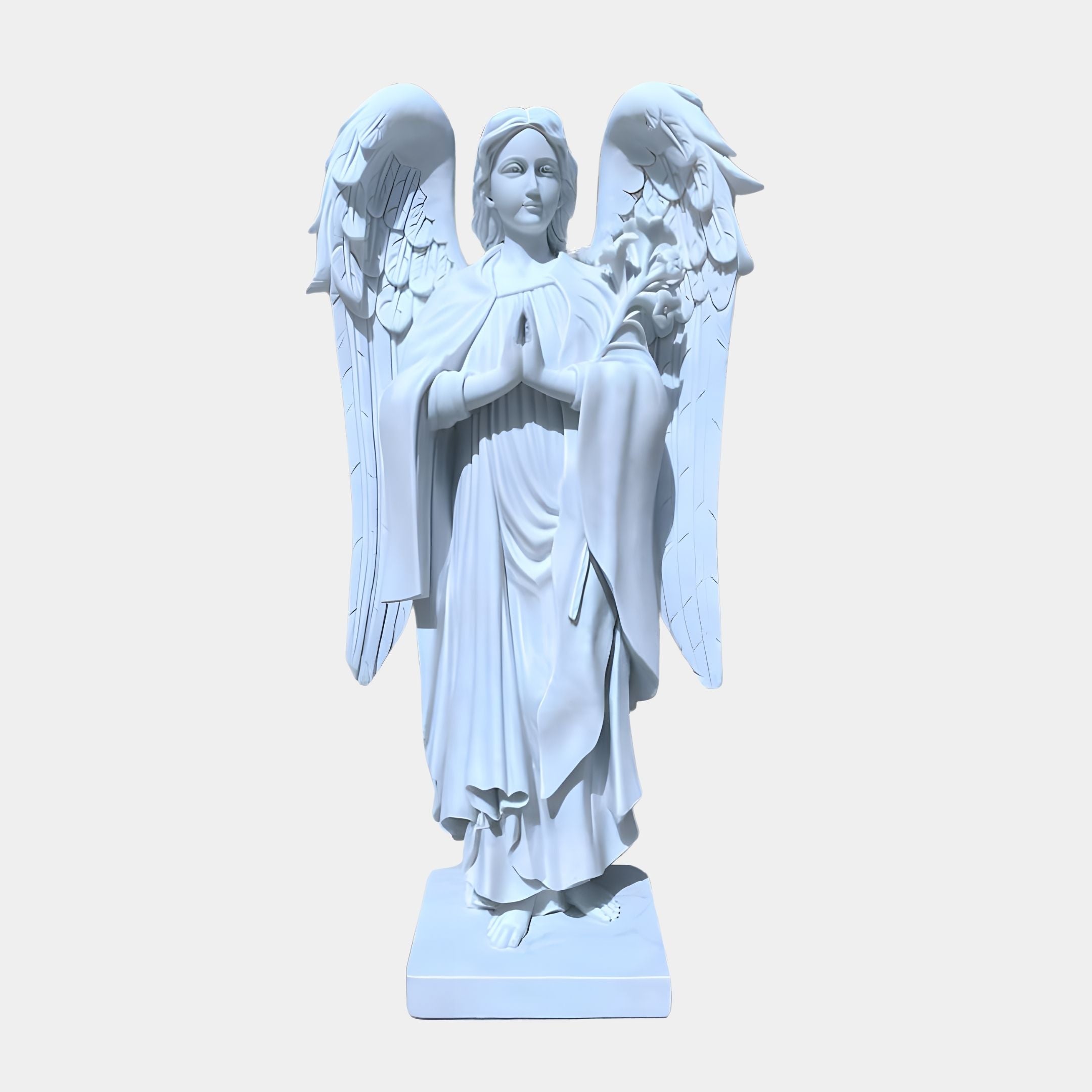 The Prayerful Laurel Angel Marble Outdoor Sculpture - 130cm by Giant Sculptures showcases a white marble angel with outstretched wings and detailed feathers. Its long robes drape elegantly as its hands meet in prayer, standing on a rectangular base against a plain backdrop.