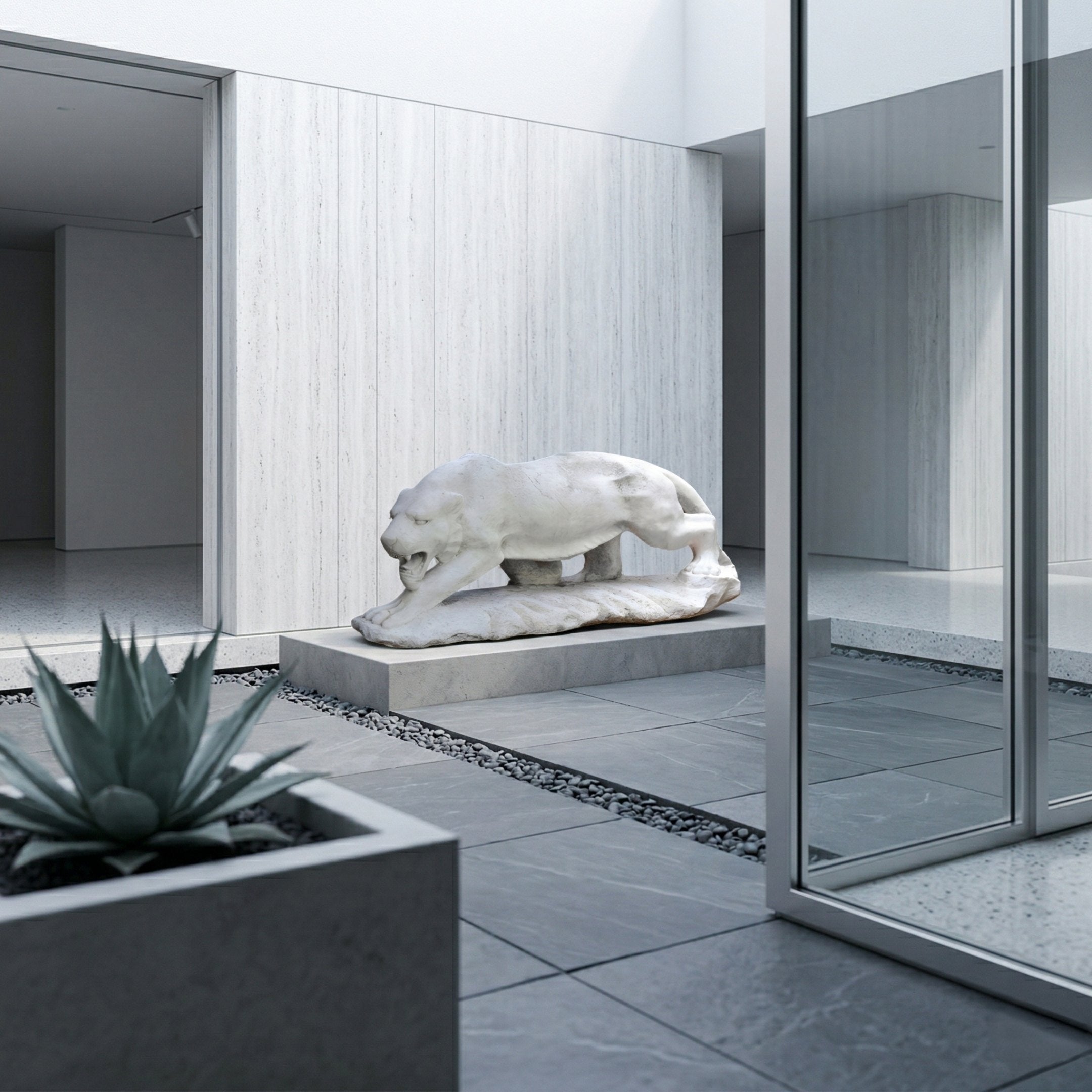 The Prowling Panther Marble Outdoor Sculpture - 65cm by Giant Sculptures stands in a minimalist stone-tiled courtyard with a succulent planter and glass walls, where modern architecture highlights the statue's serene elegance.