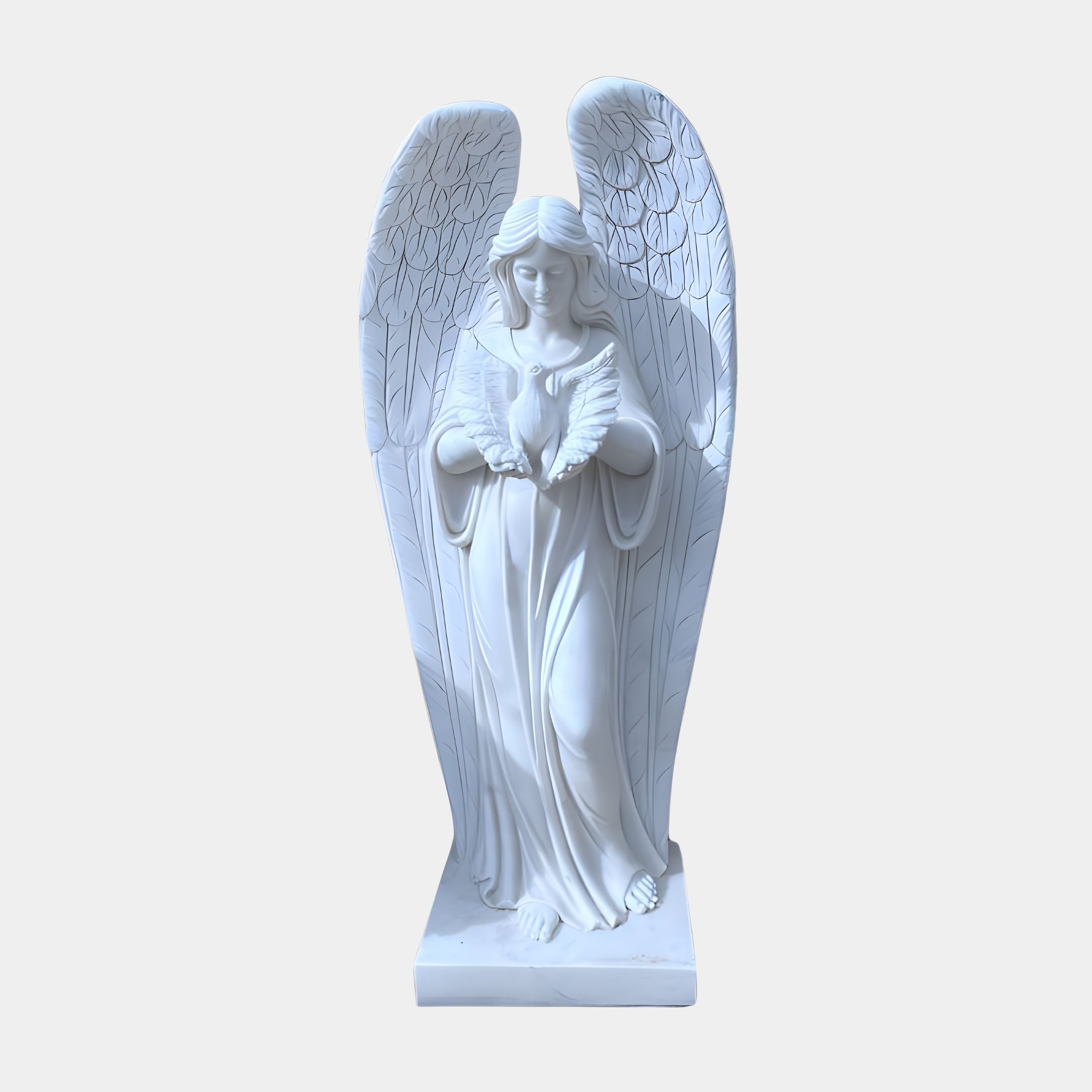 The Giant Sculptures Peaceful Dove Angel Marble Outdoor Sculpture, 180cm, features a white marble angel with detailed wings and long hair on a rectangular base, gently holding a dove. It embodies serenity and elegance against a plain background.